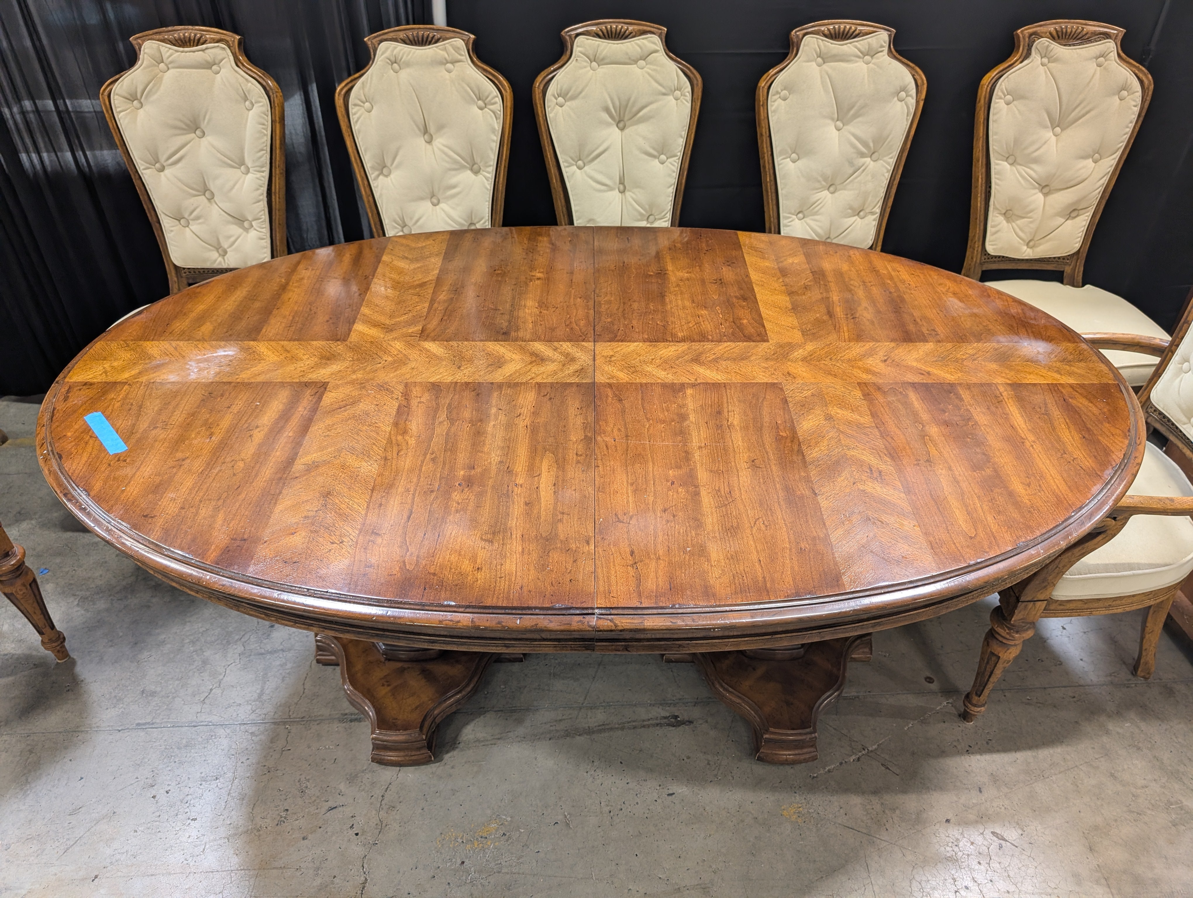 Traditional Carved Wood Dining Table with Eight Upholstered Chairs and Three Leafs