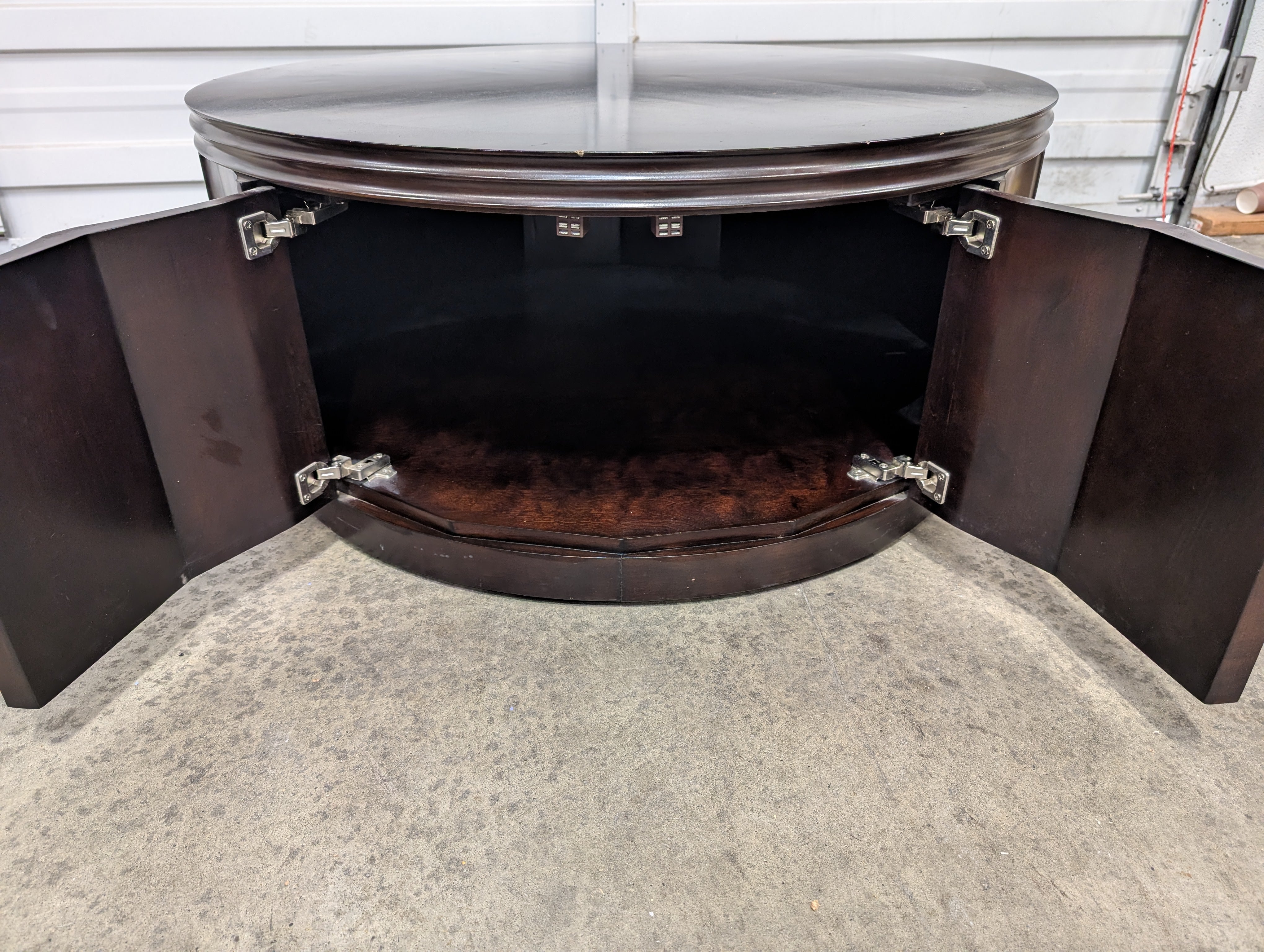 Circular Dark Wood Coffee Table with Paneled Sides