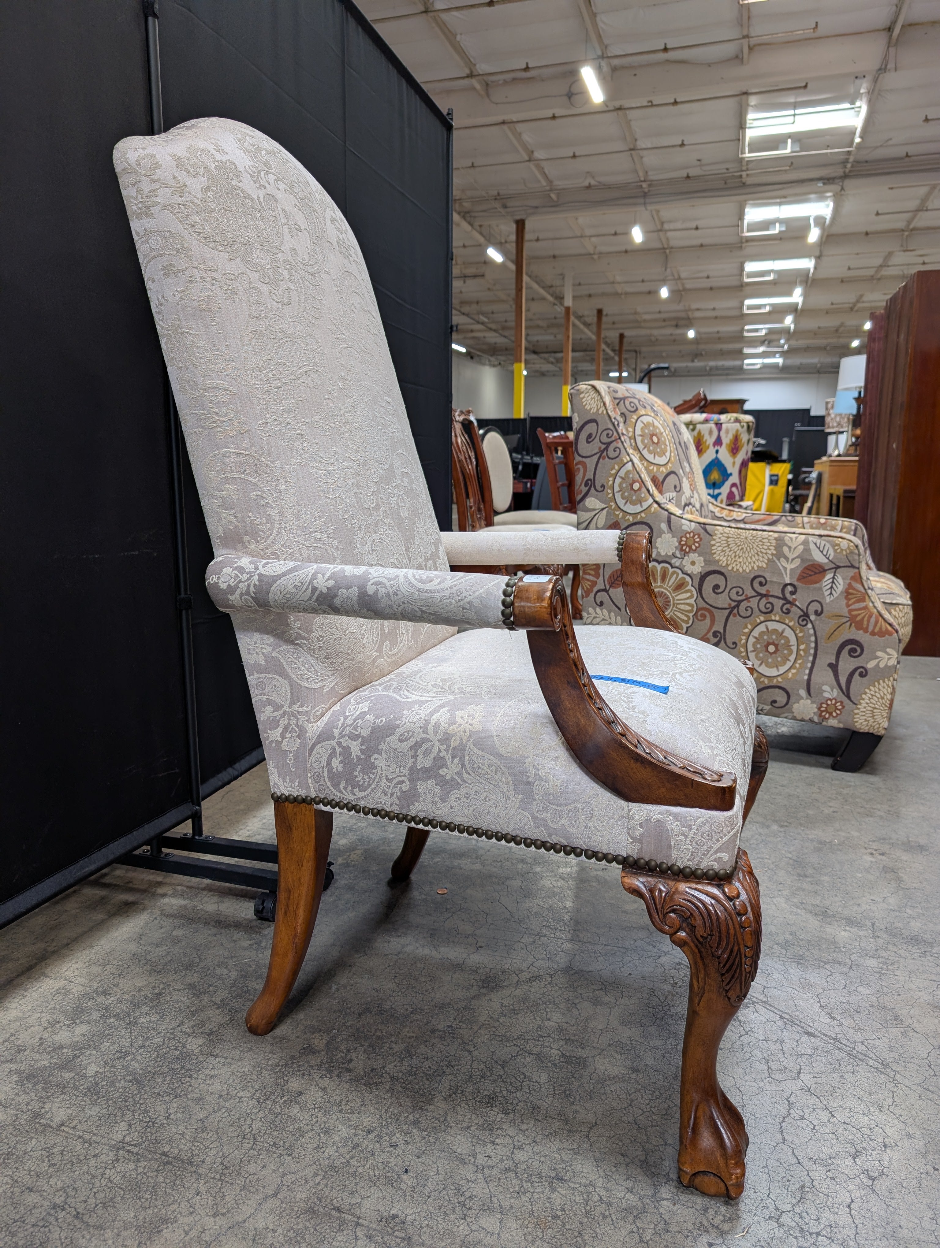 Ornate Carved Wood High-Back Armchair with Damask Upholstery