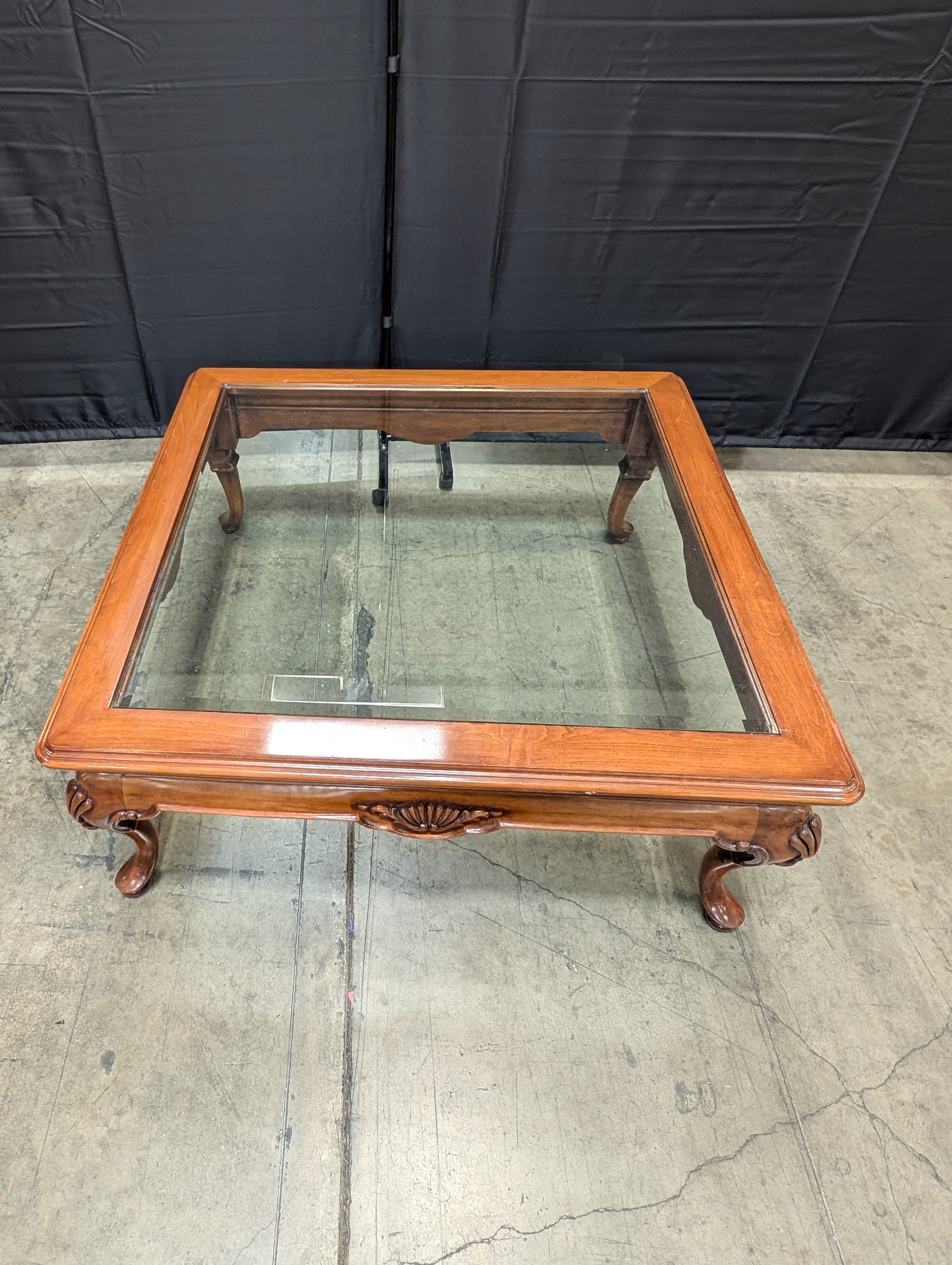 Traditional Carved Wood and Glass Top Coffee Table