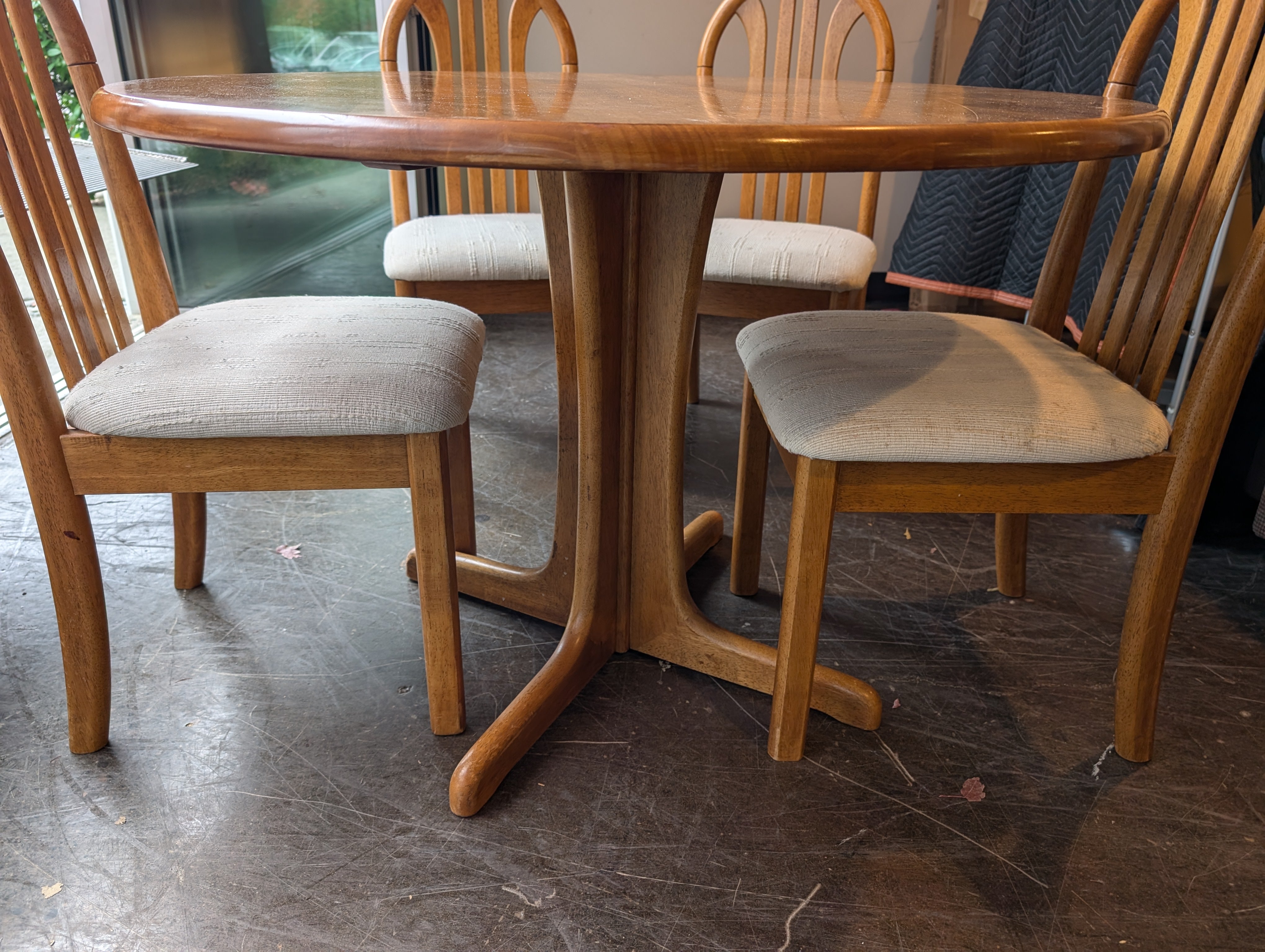 Five-Piece Wood Dining Set with Round Table and Padded Chairs