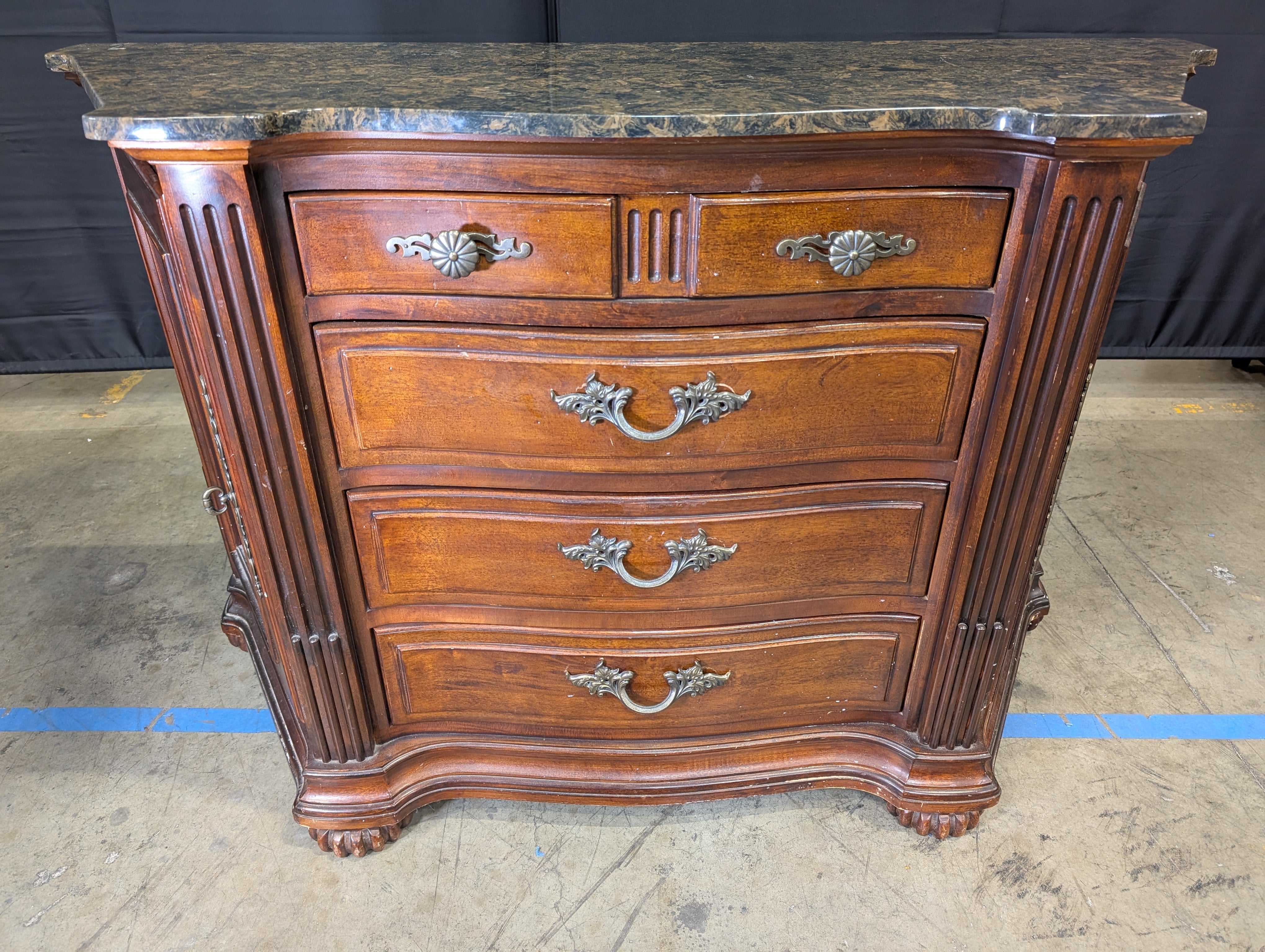Traditional Cherry Stained Wood Dresser with Ornate Hardware
