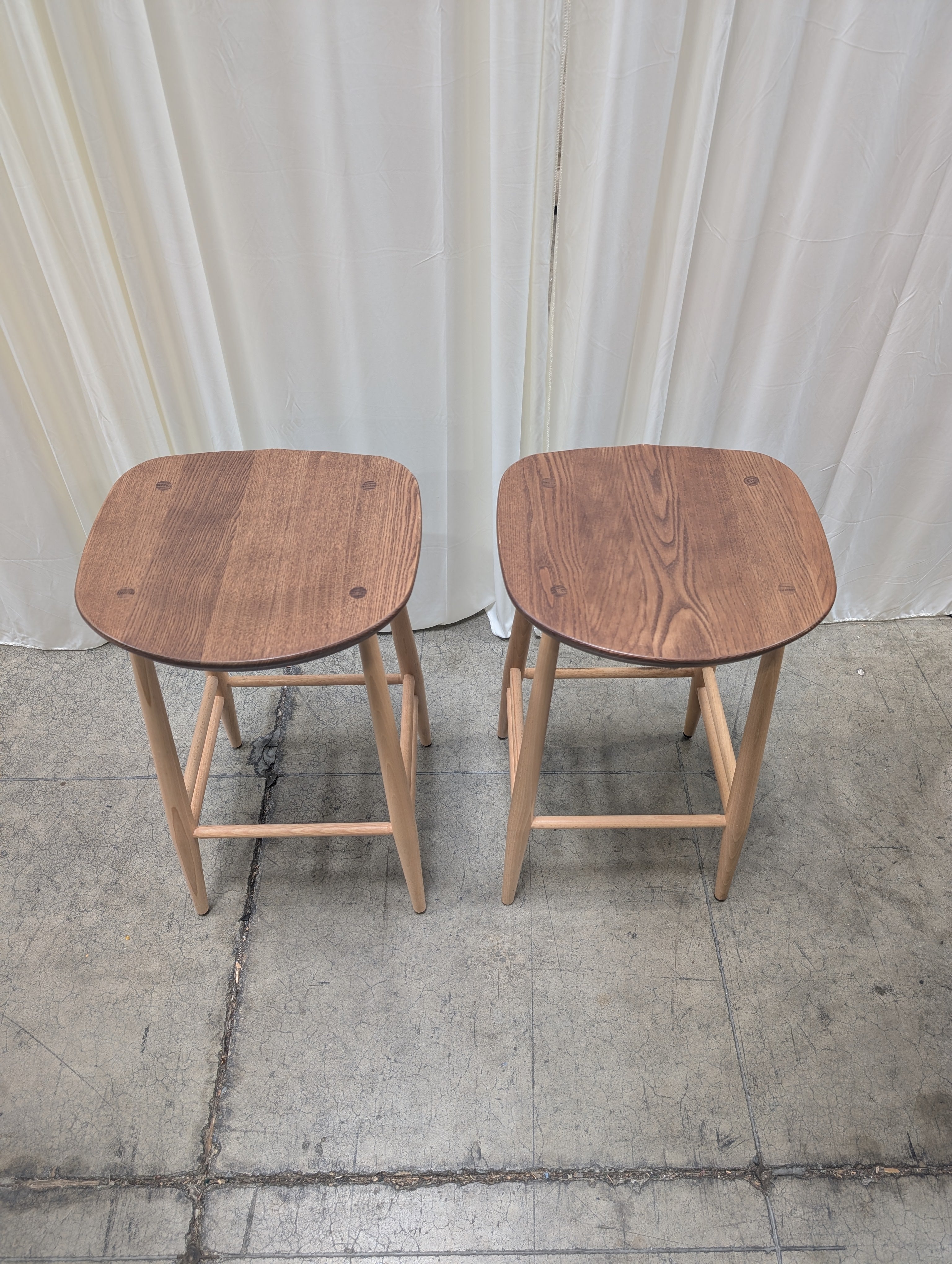 Pair of Ercol Furniture Two-Tone Wood Stools