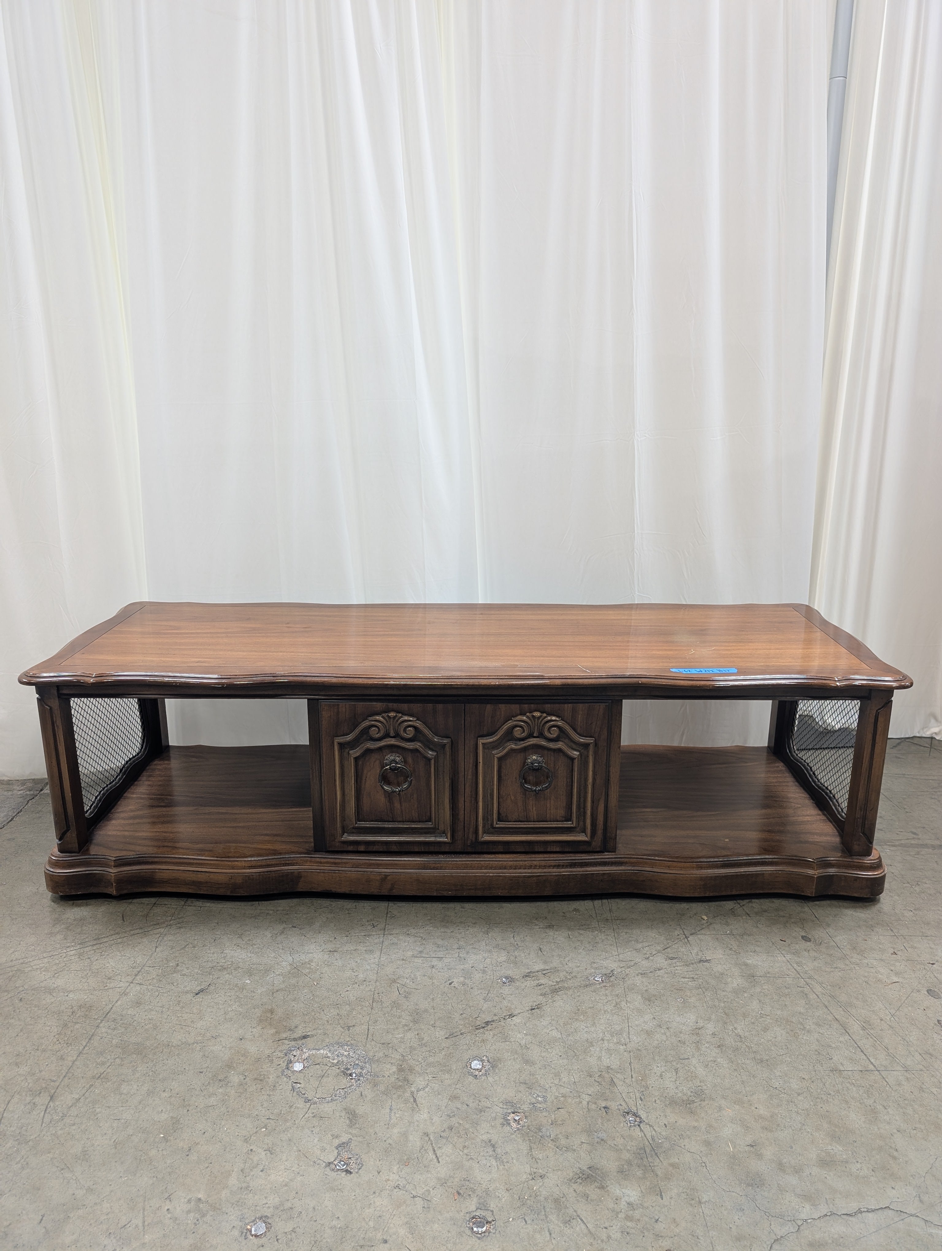 Traditional Dark Wood Coffee Table with Ornate Hardware