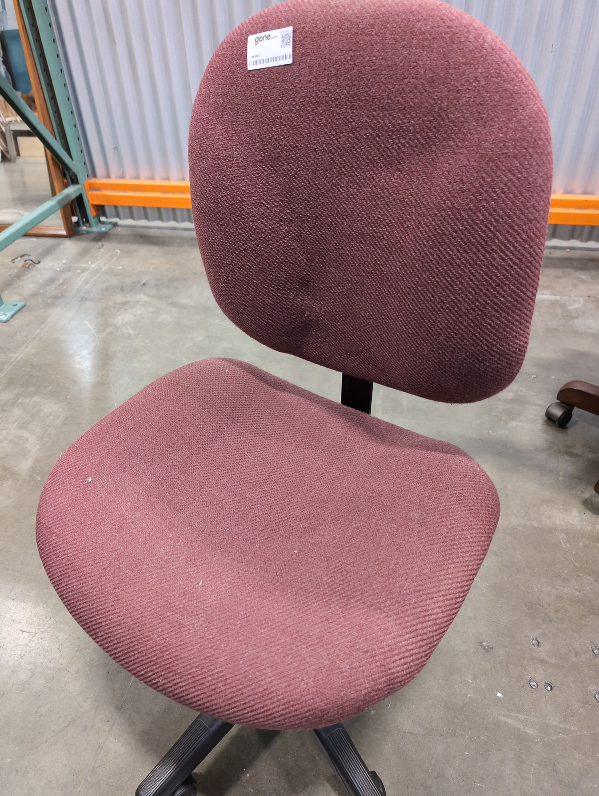 Red armless office chair