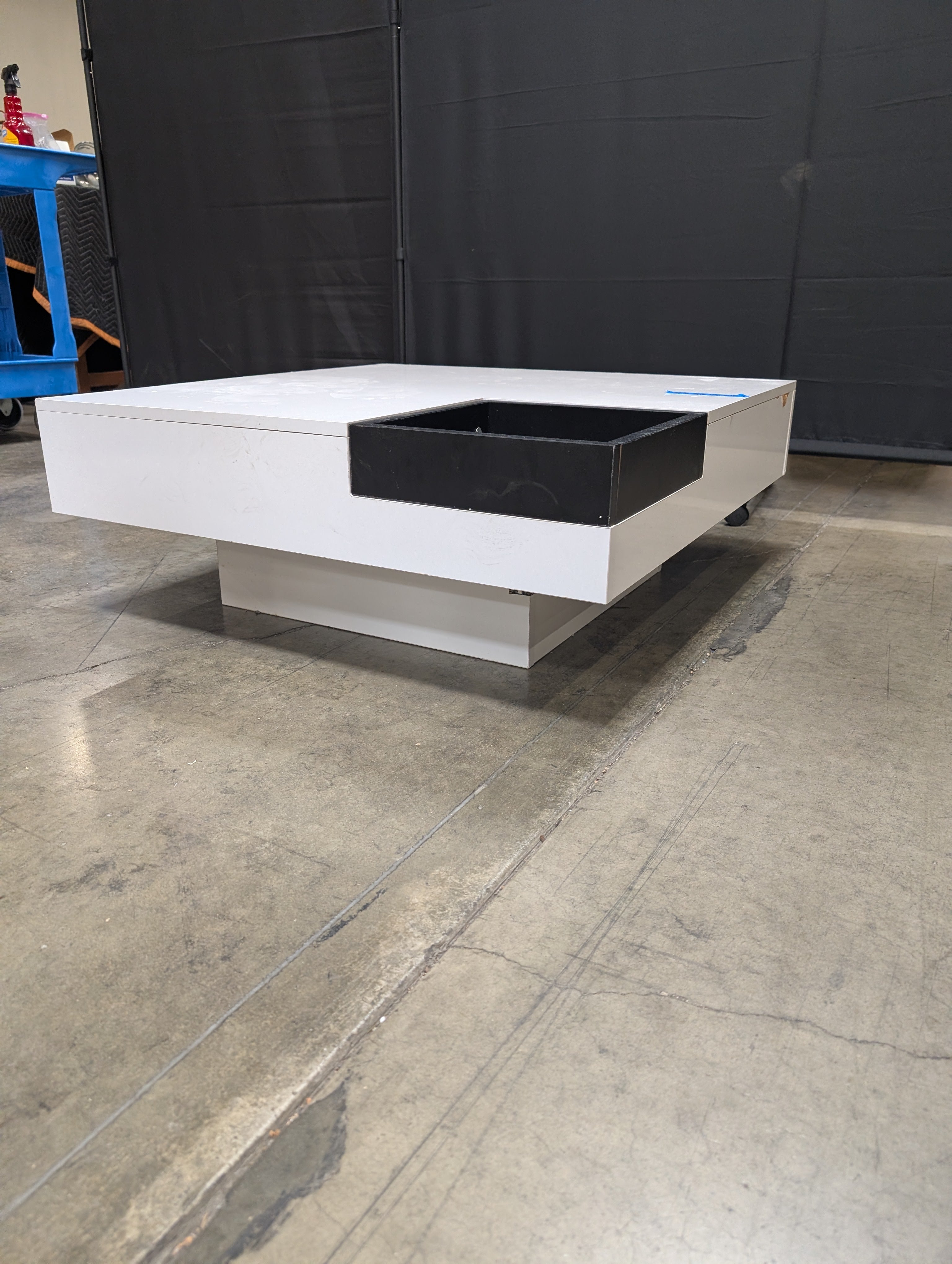 Contemporary High-Gloss White Coffee Table with Black Recessed Compartment
