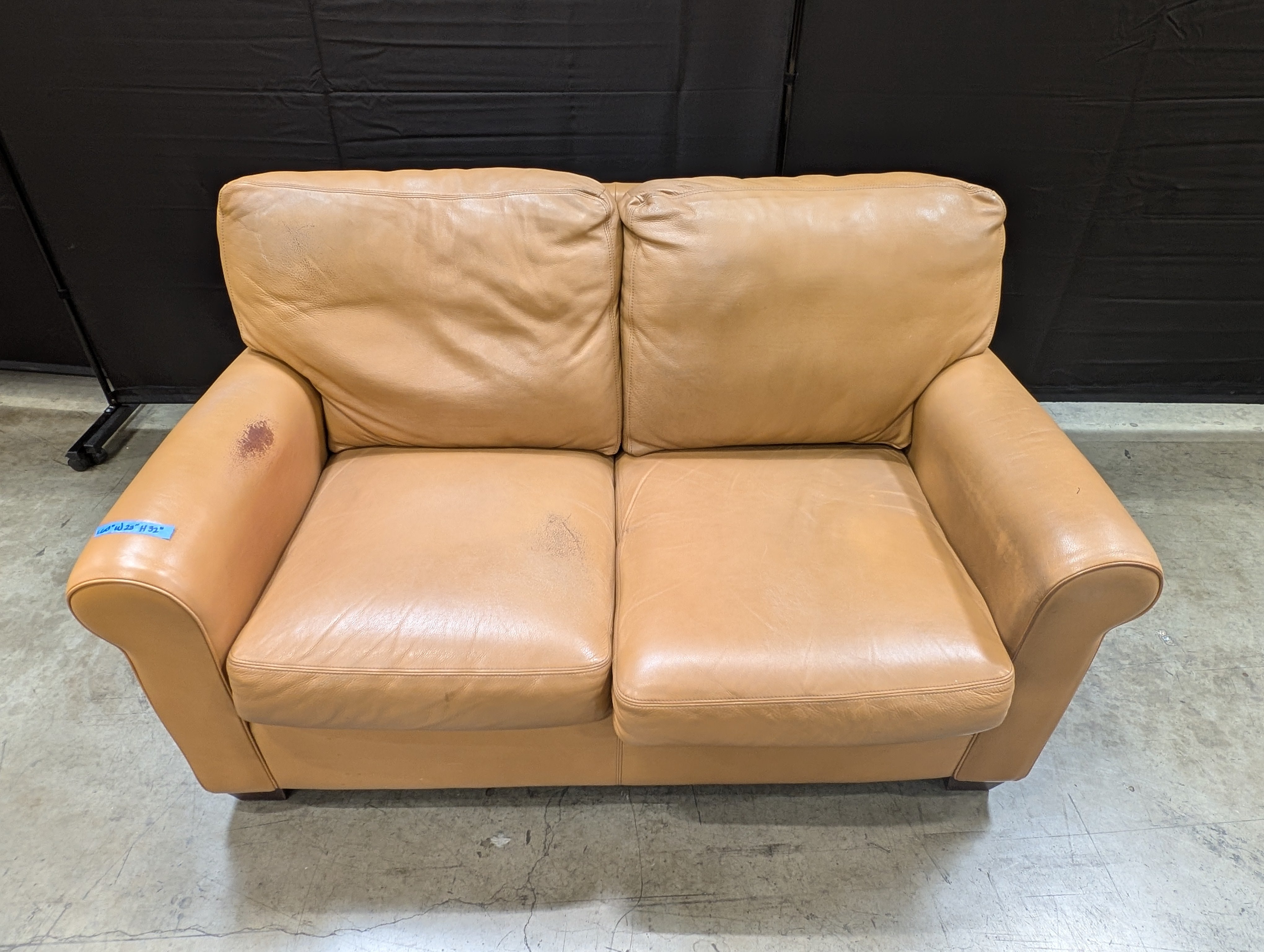 Compact Two-Seater Tan Leather Sofa