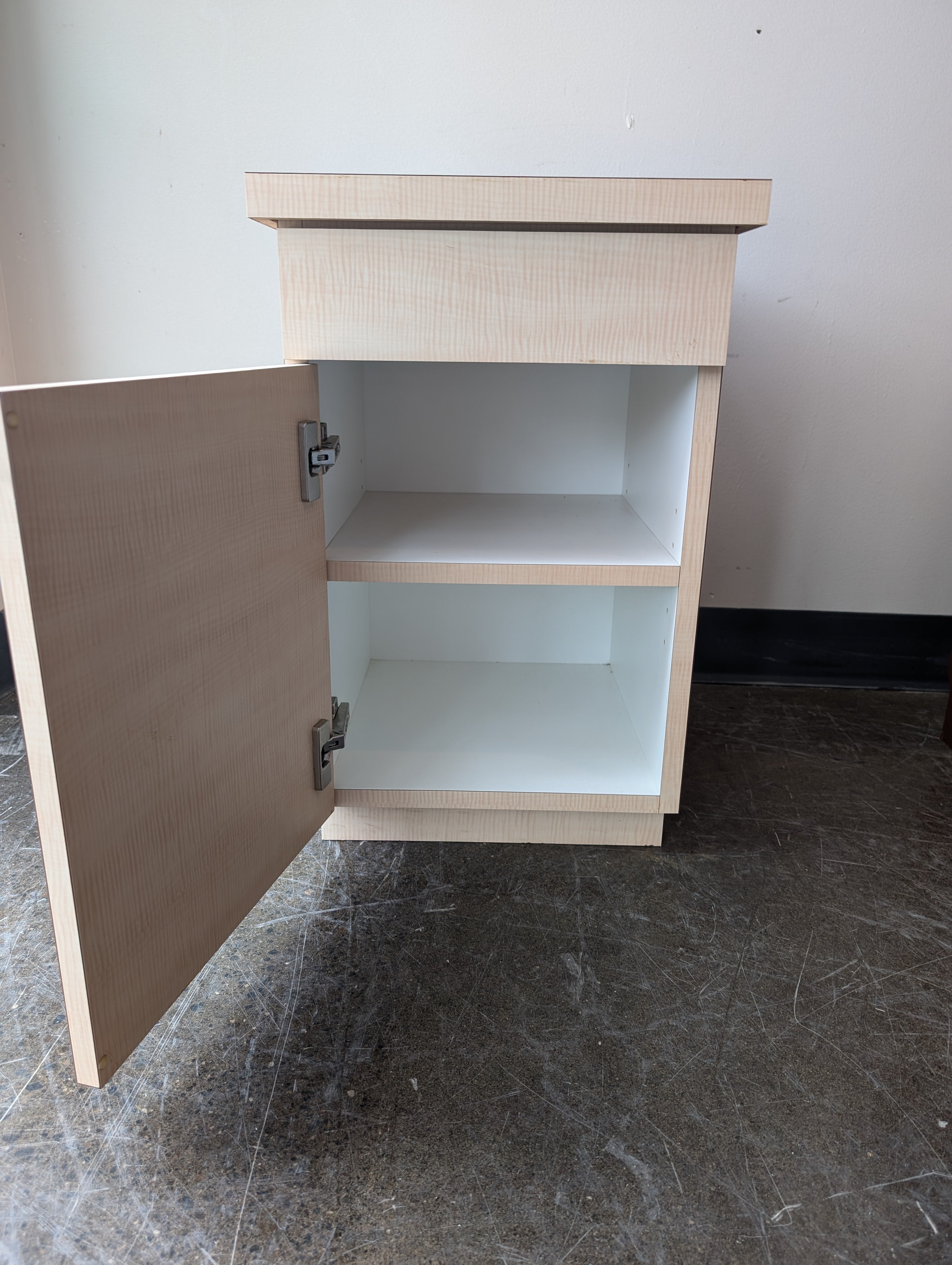 Versatile Light Wood Tone Storage Cabinet