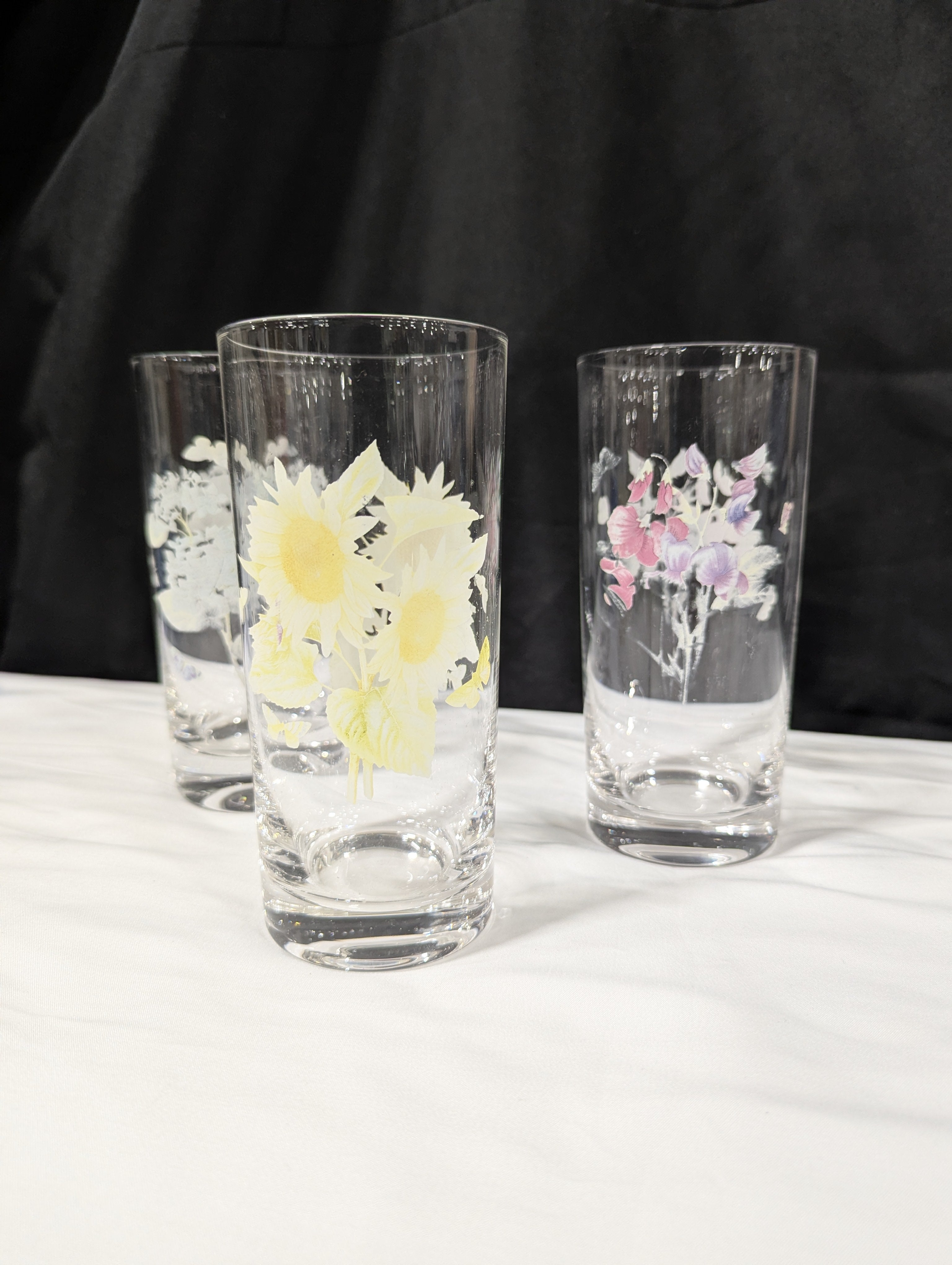 Set of Three Clear Glass Highball Tumblers with Assorted Floral Butterfly Designs
