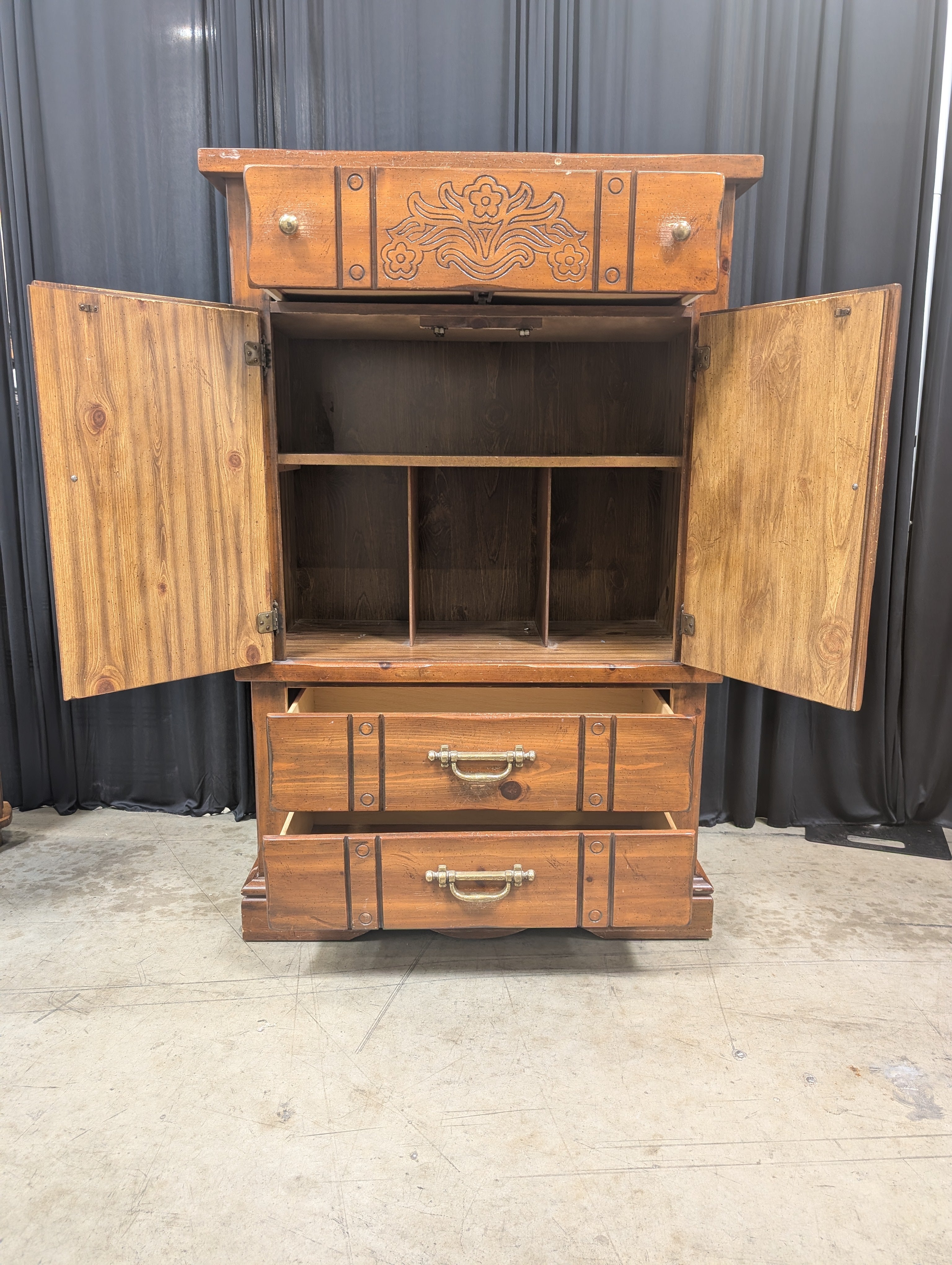 Rustic Brown Wood Armoire with Carved Details