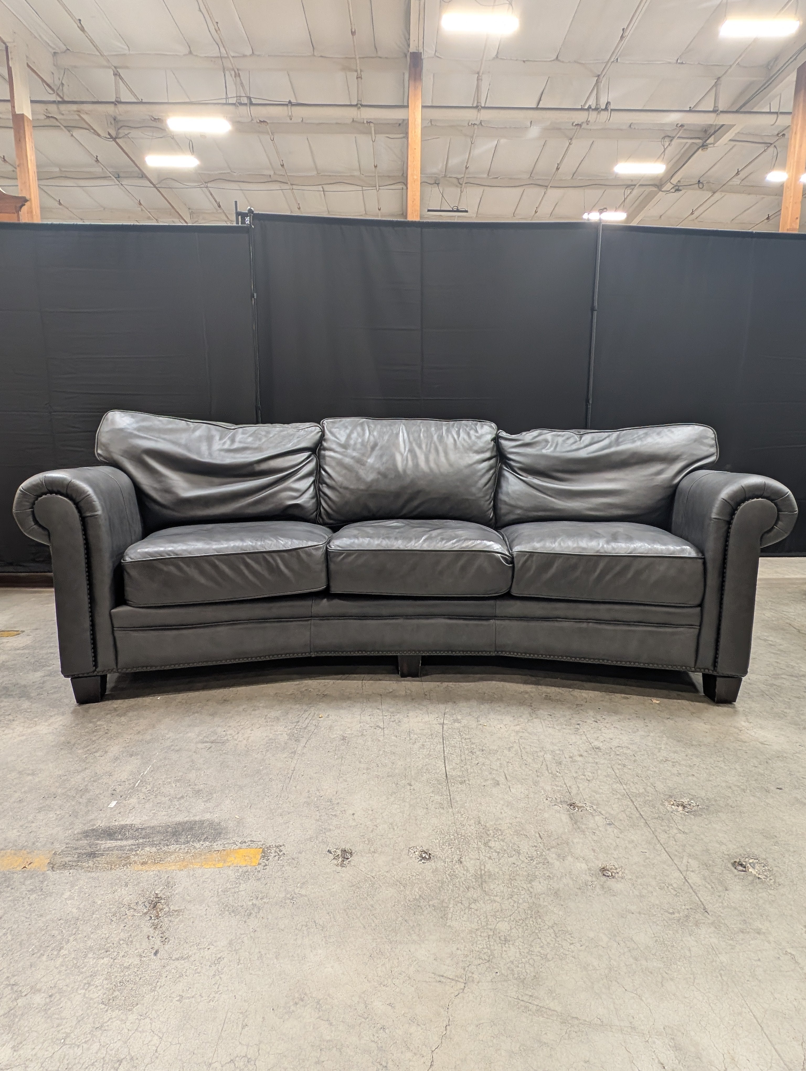 Curved Dark Grey Leather Three-Seater Sofa