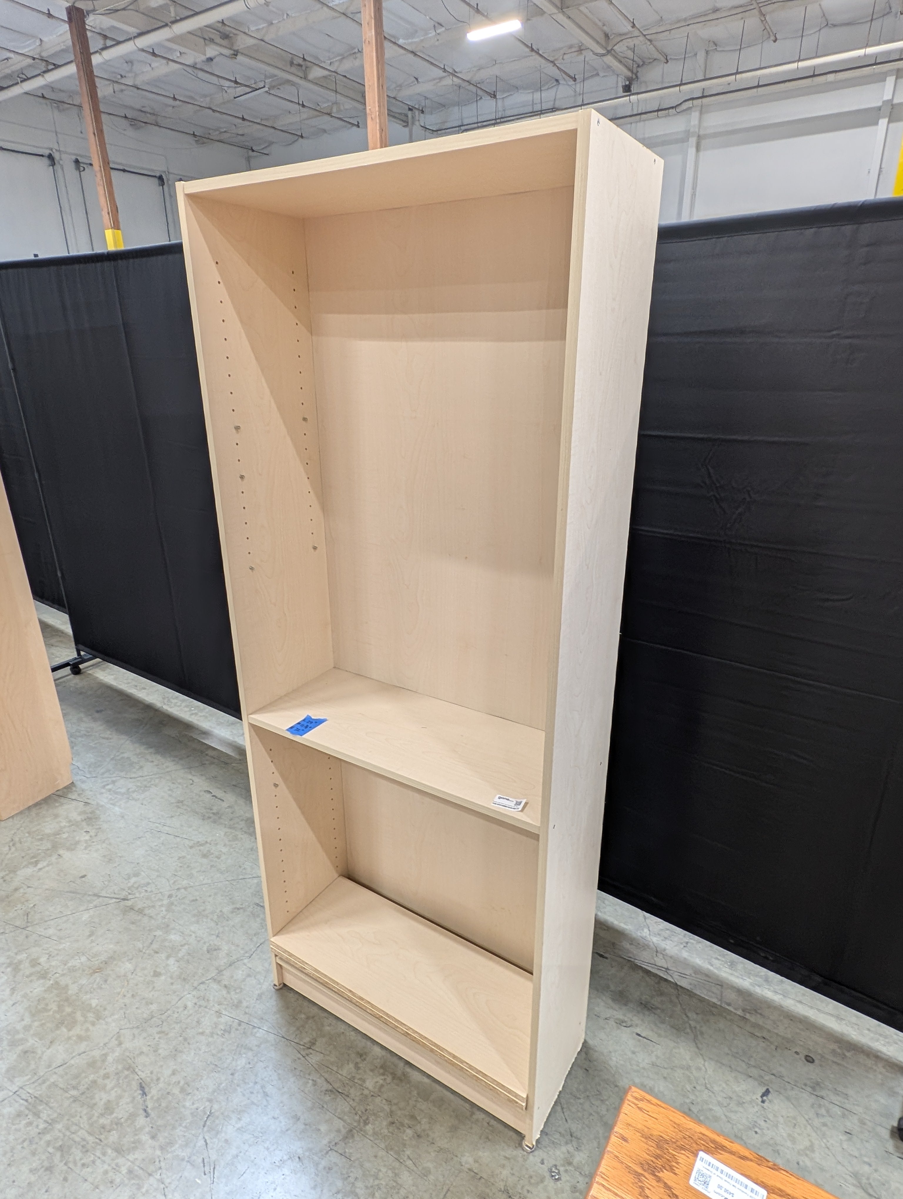 Versatile Light Wood Tone Bookcase with Adjustable Shelves