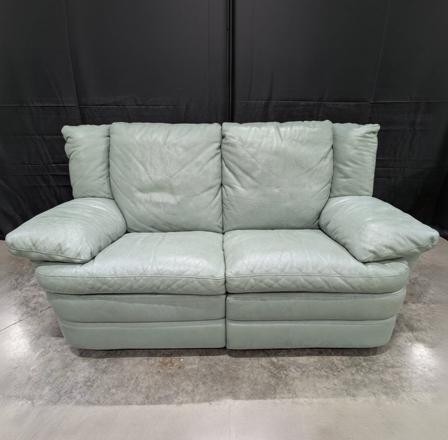 Charming Mint Green Leather Two-Seater Sofa with Plush Padded Arms