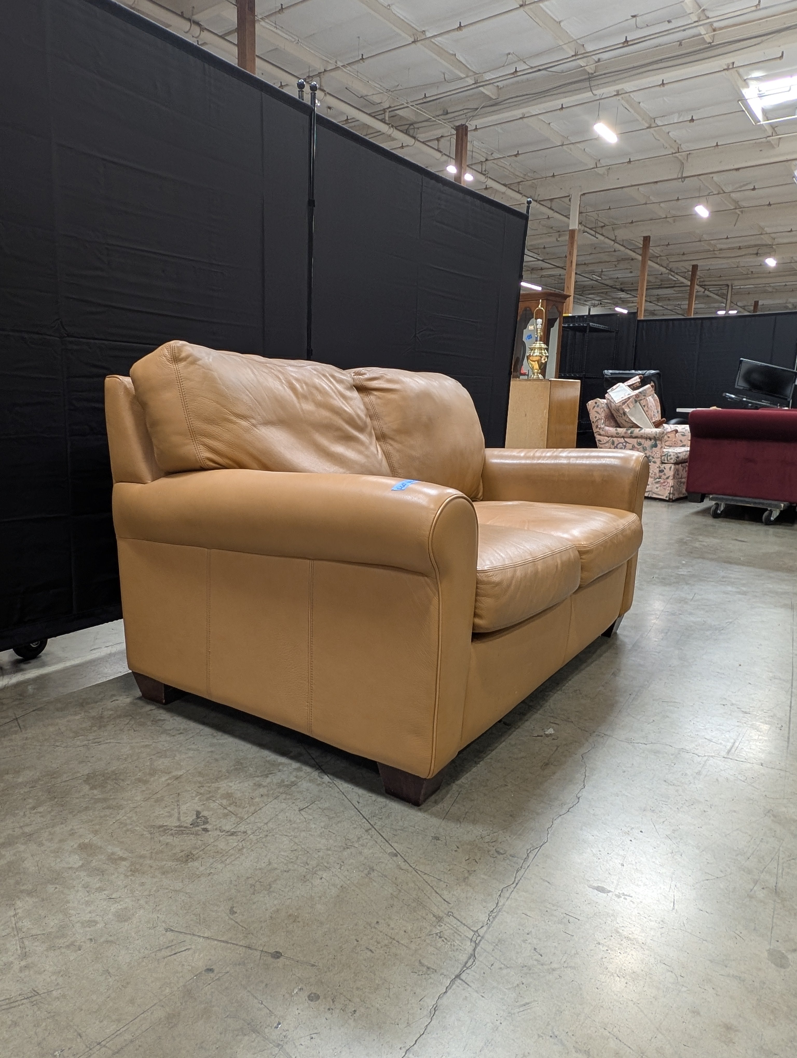 Compact Two-Seater Tan Leather Sofa