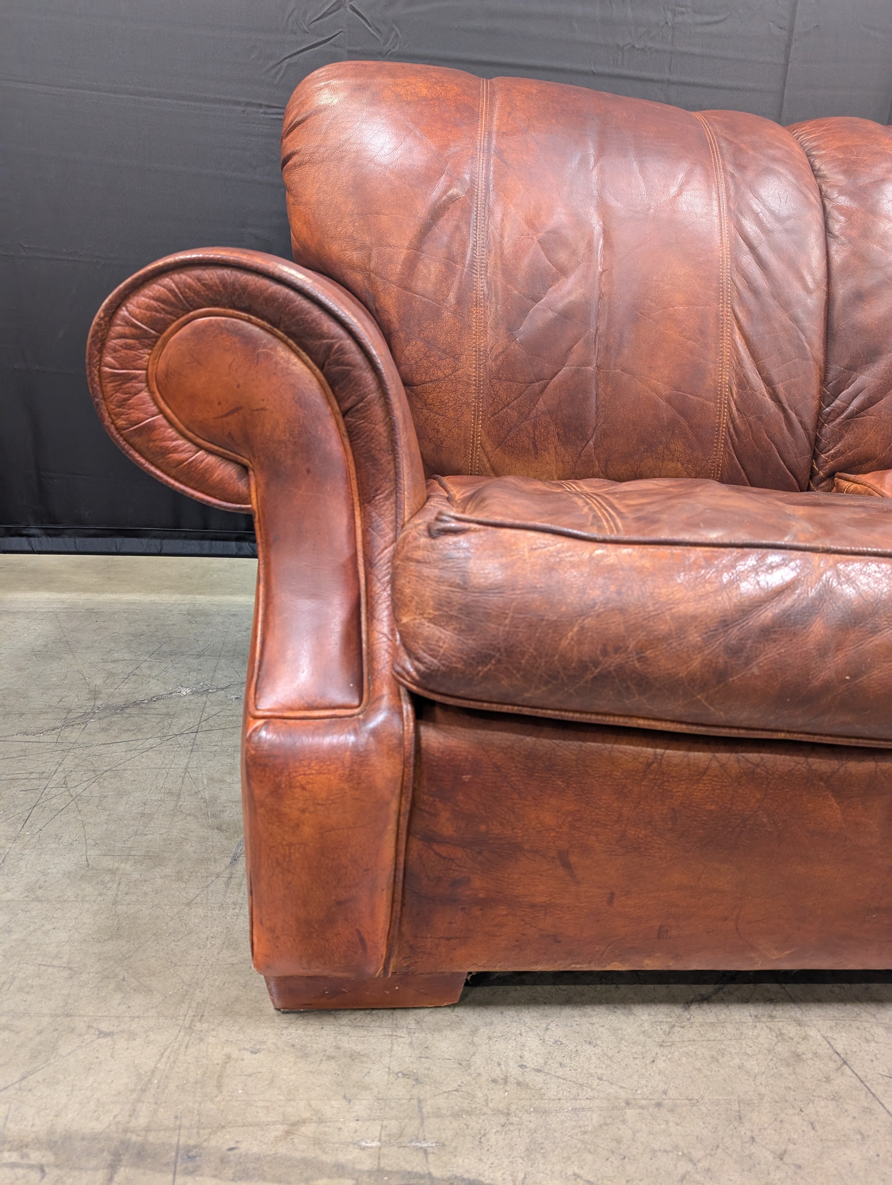Classic Brown Leather Three-Seater Sofa with Rolled Arms