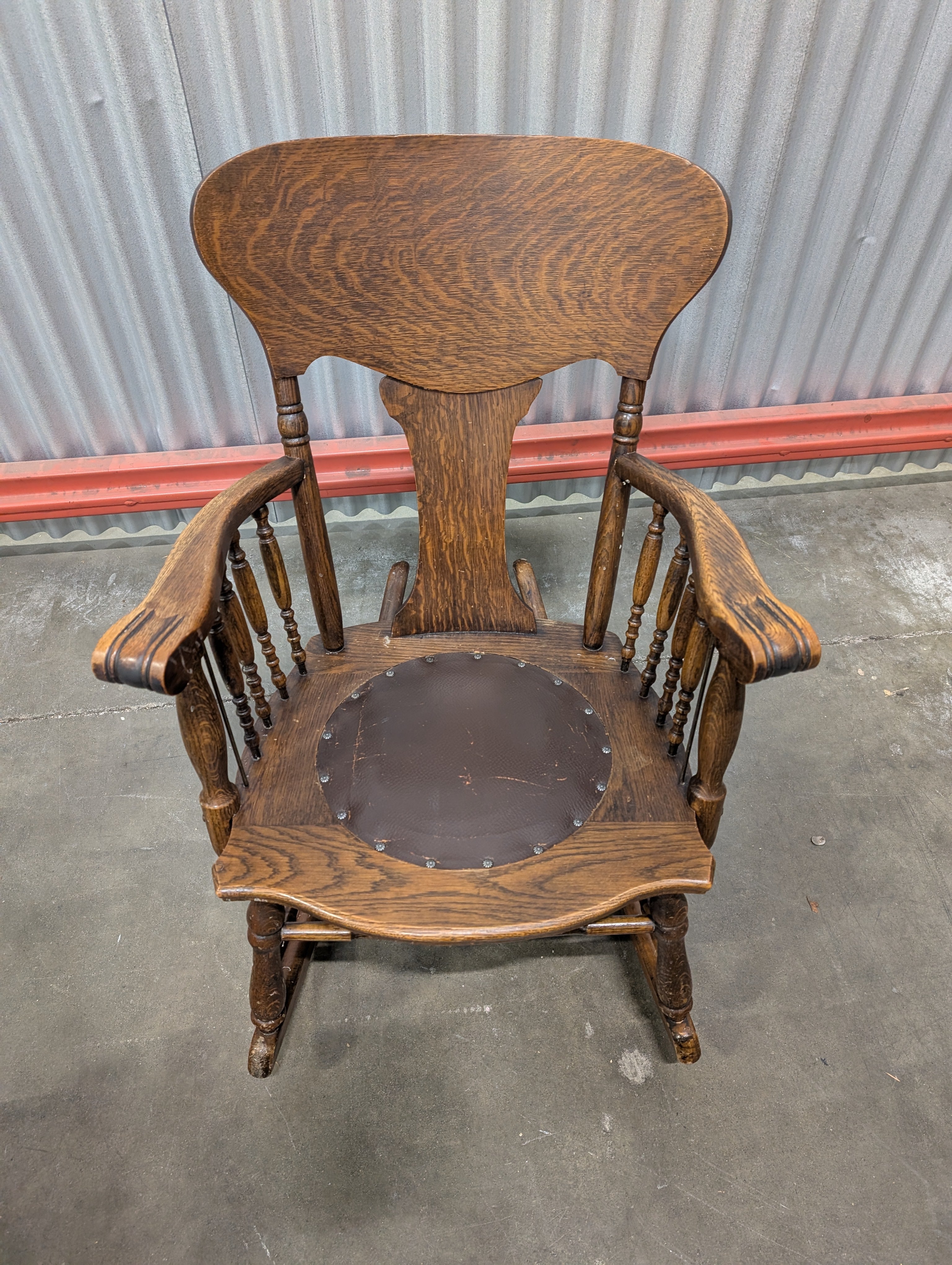 Antique Dark Wood Rocking Chair with Leather Seat