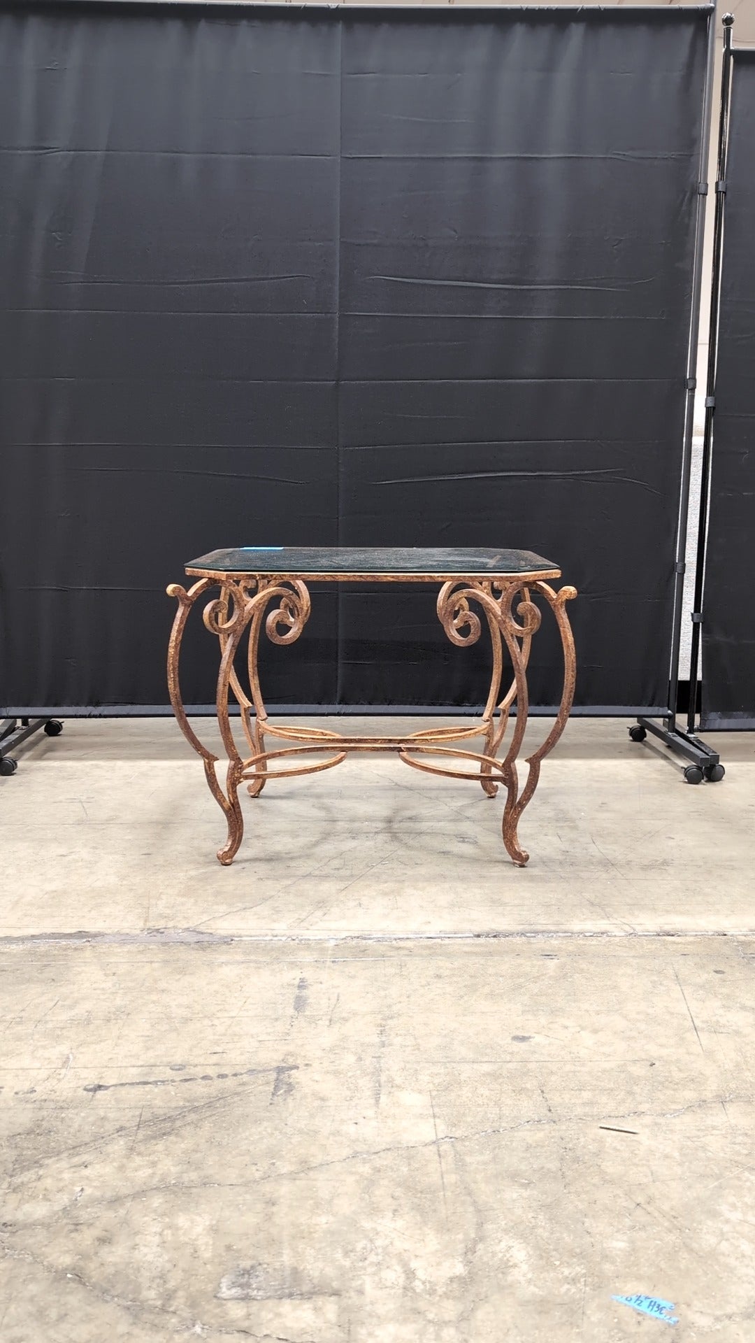 Octagonal Glass Top Accent Table with Scrollwork Metal Base