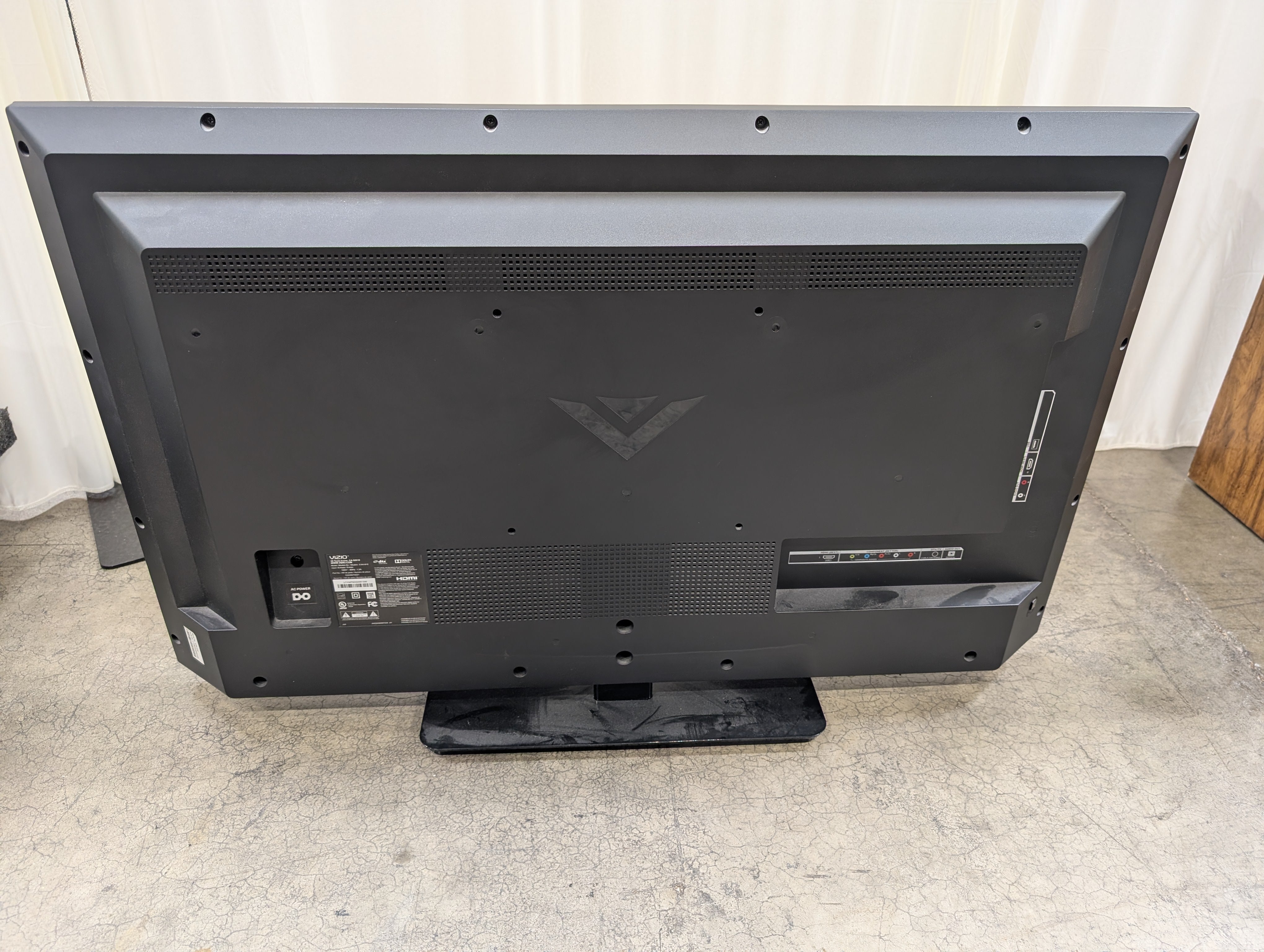 Black Flat Screen VIZIO TV with Stand
