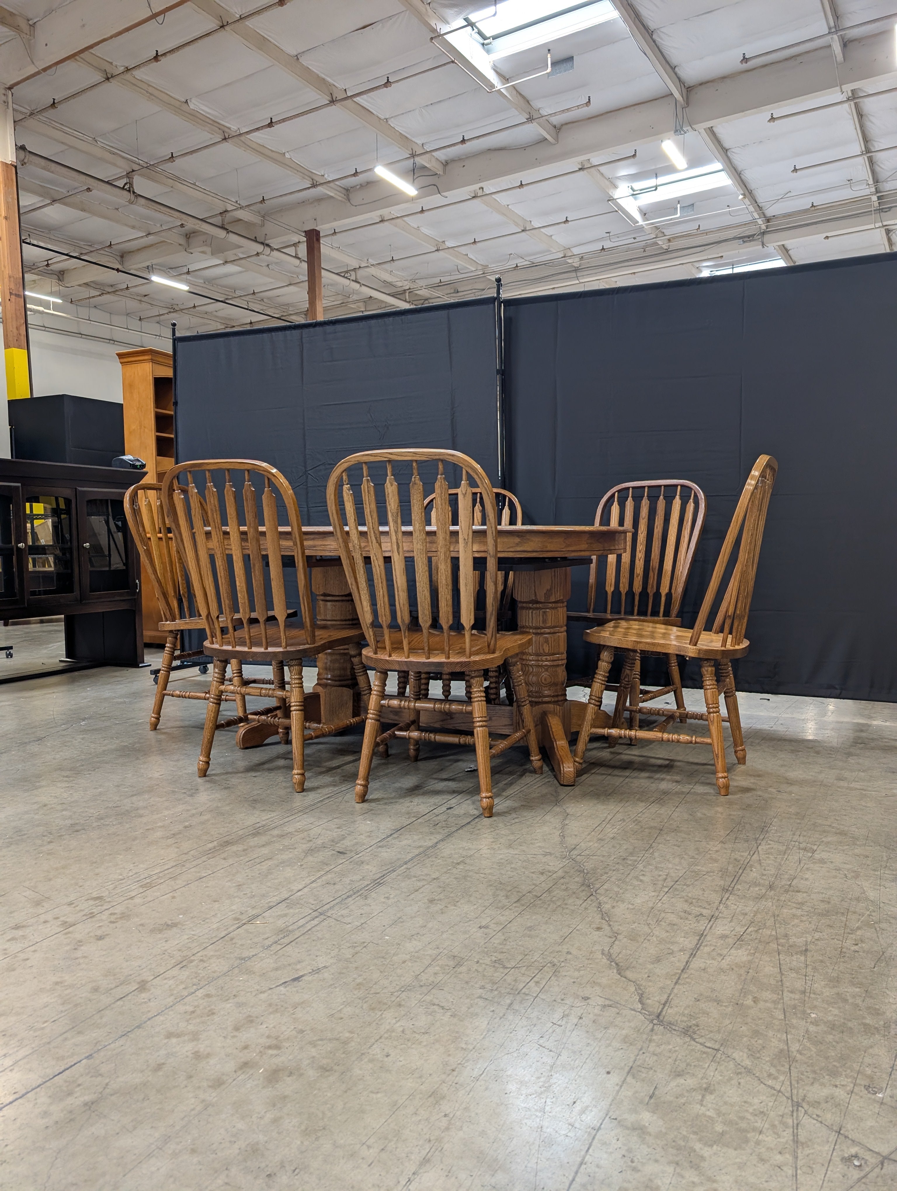 Oak Finish Dining Table with Six Spindle Back Chairs