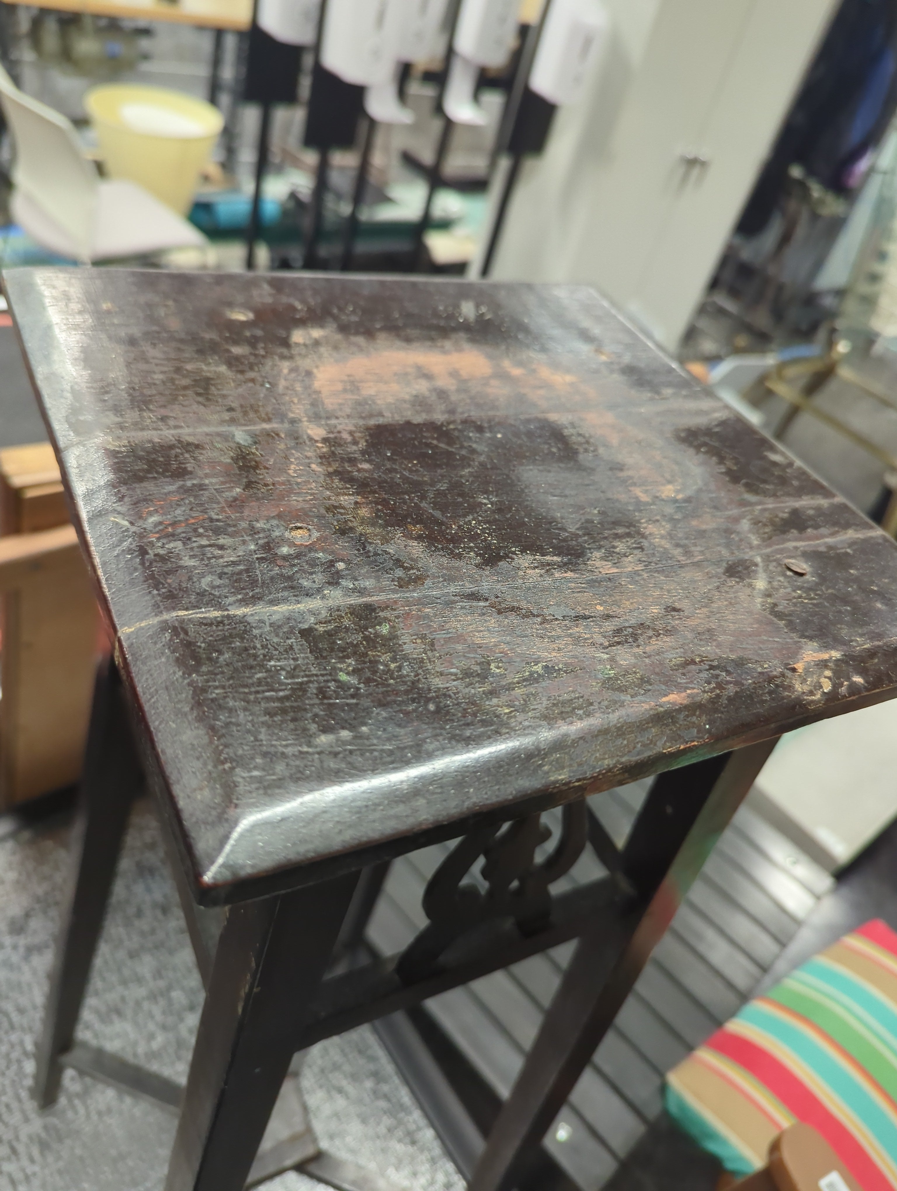 Dark Wood End Table with Intricate Carving