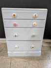 Pale Blue Wooden Four-Drawer Chest with Decorative Knobs