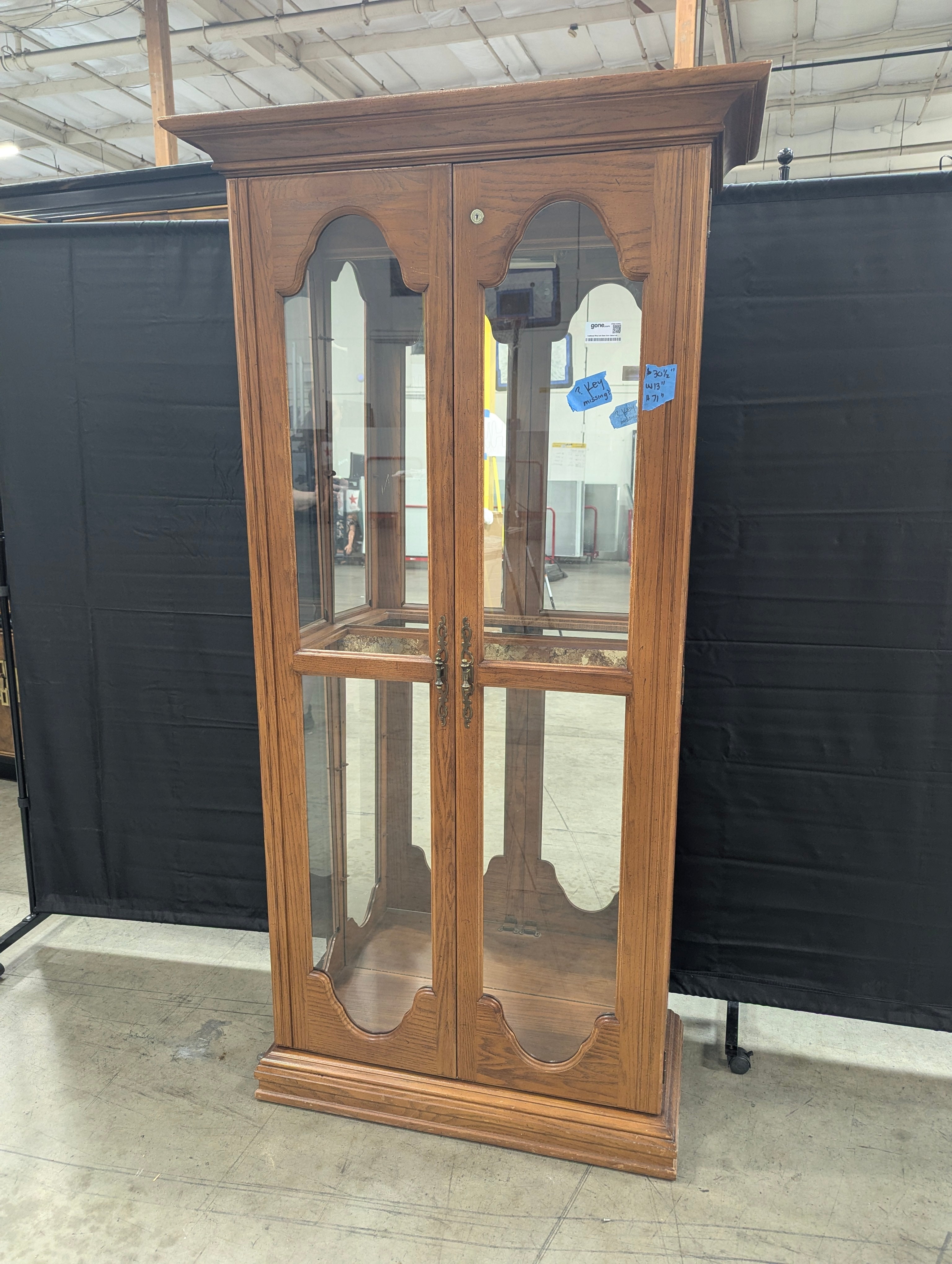 Traditional Wood and Glass Curio Cabinet with Arched Doors