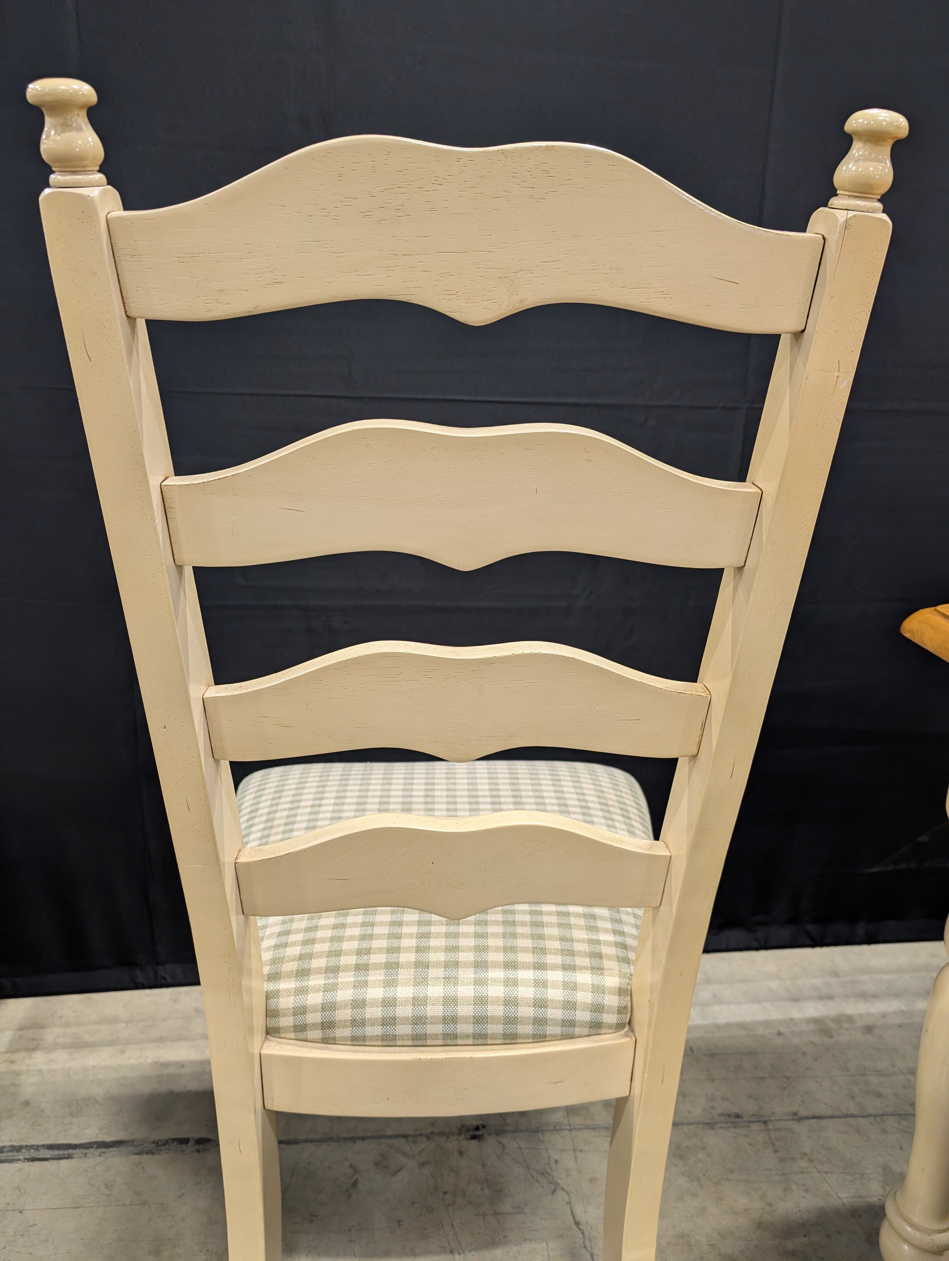Rustic Wood Dining Table with Four Ladder-Back Chairs