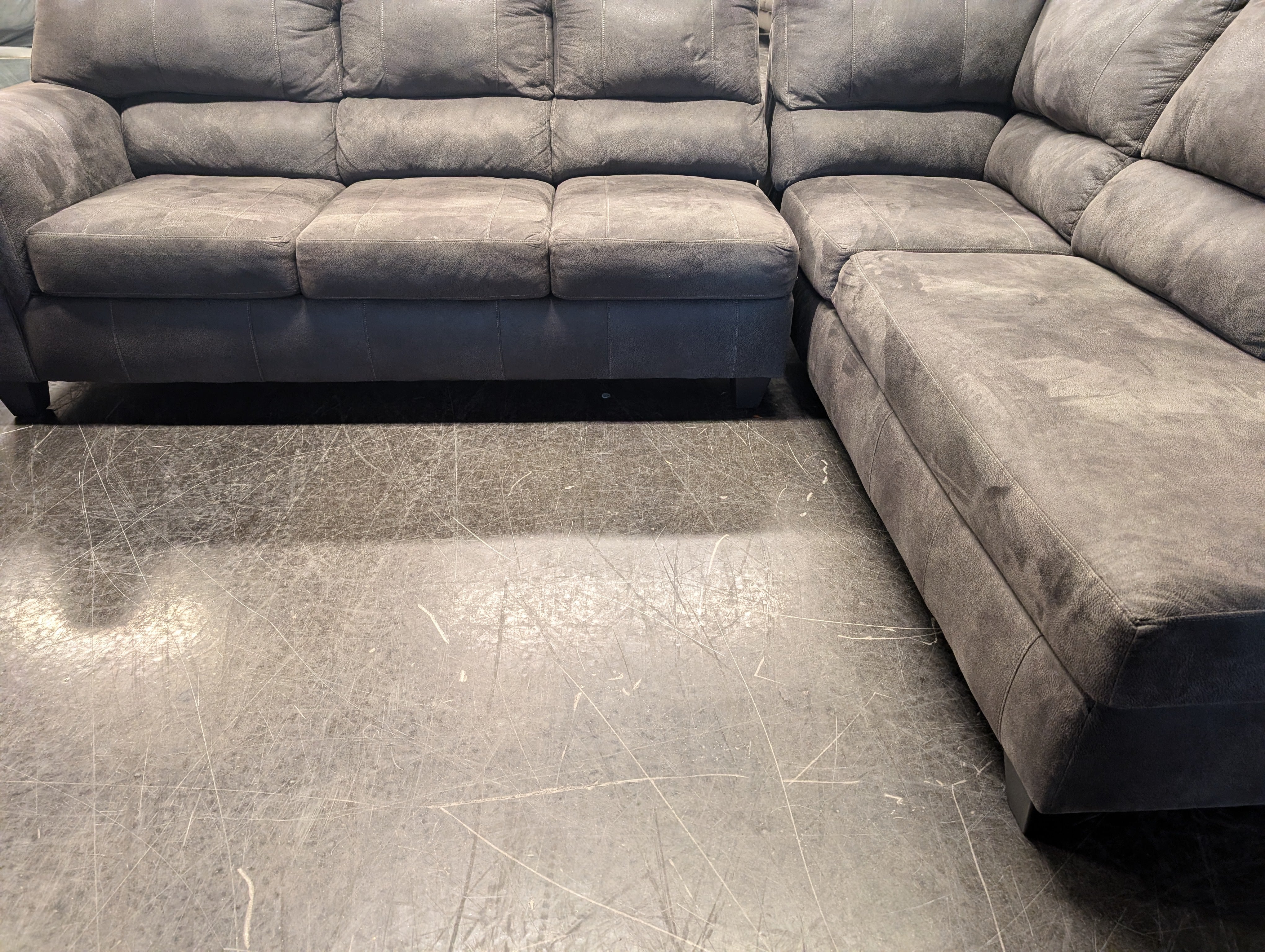 Spacious Taupe Sectional Sofa with Integrated Chaise