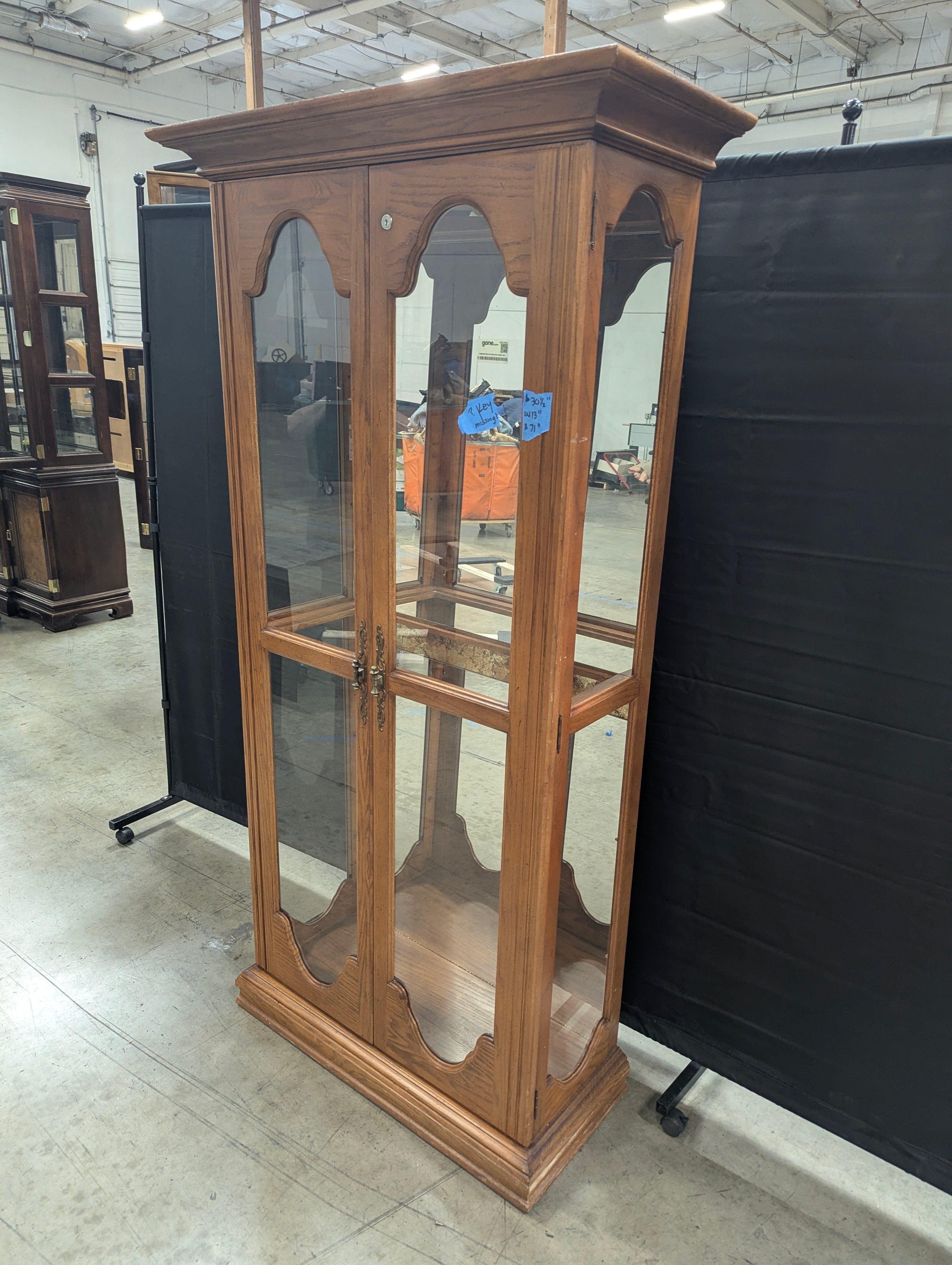 Traditional Wood and Glass Curio Cabinet with Arched Doors