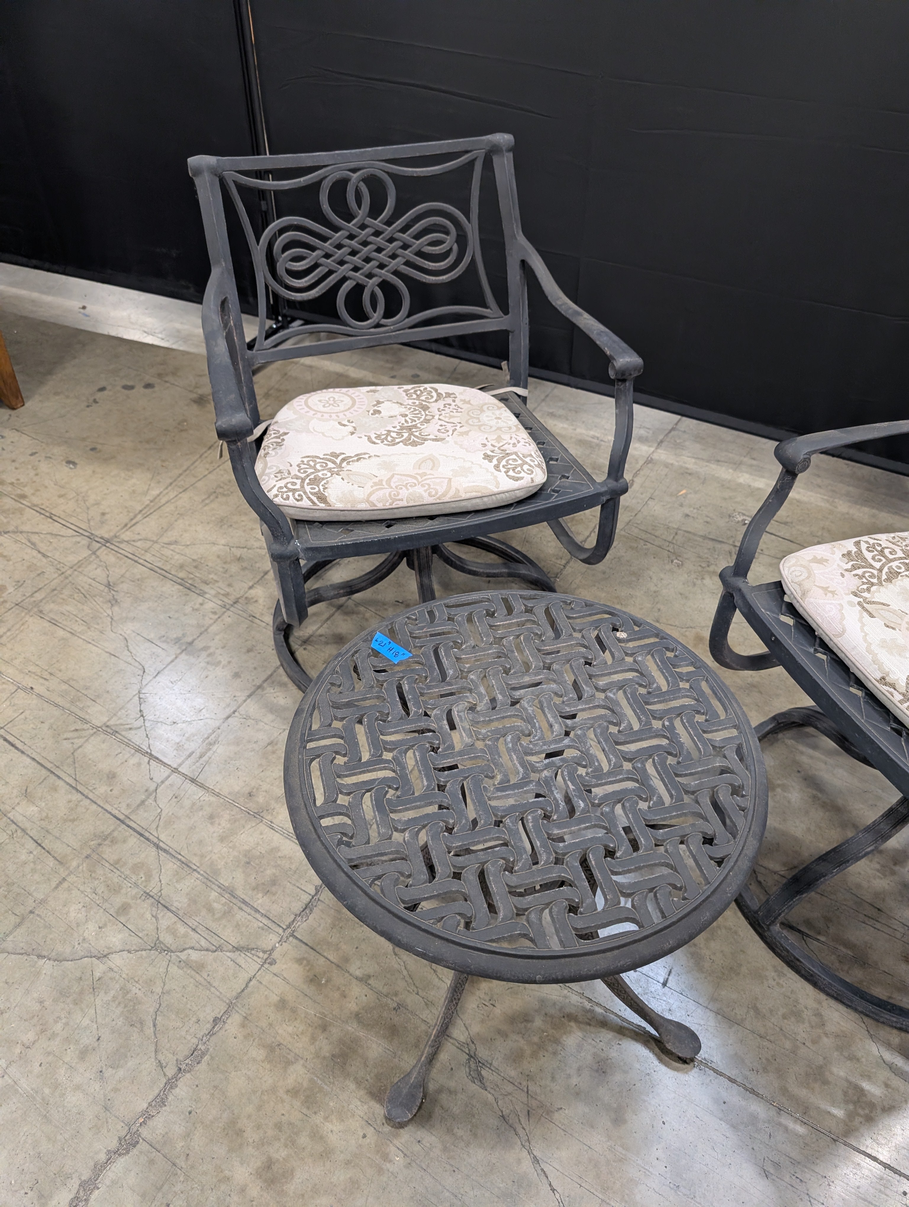 Ornate Cast Metal Outdoor Bistro Set with Swivel Chairs