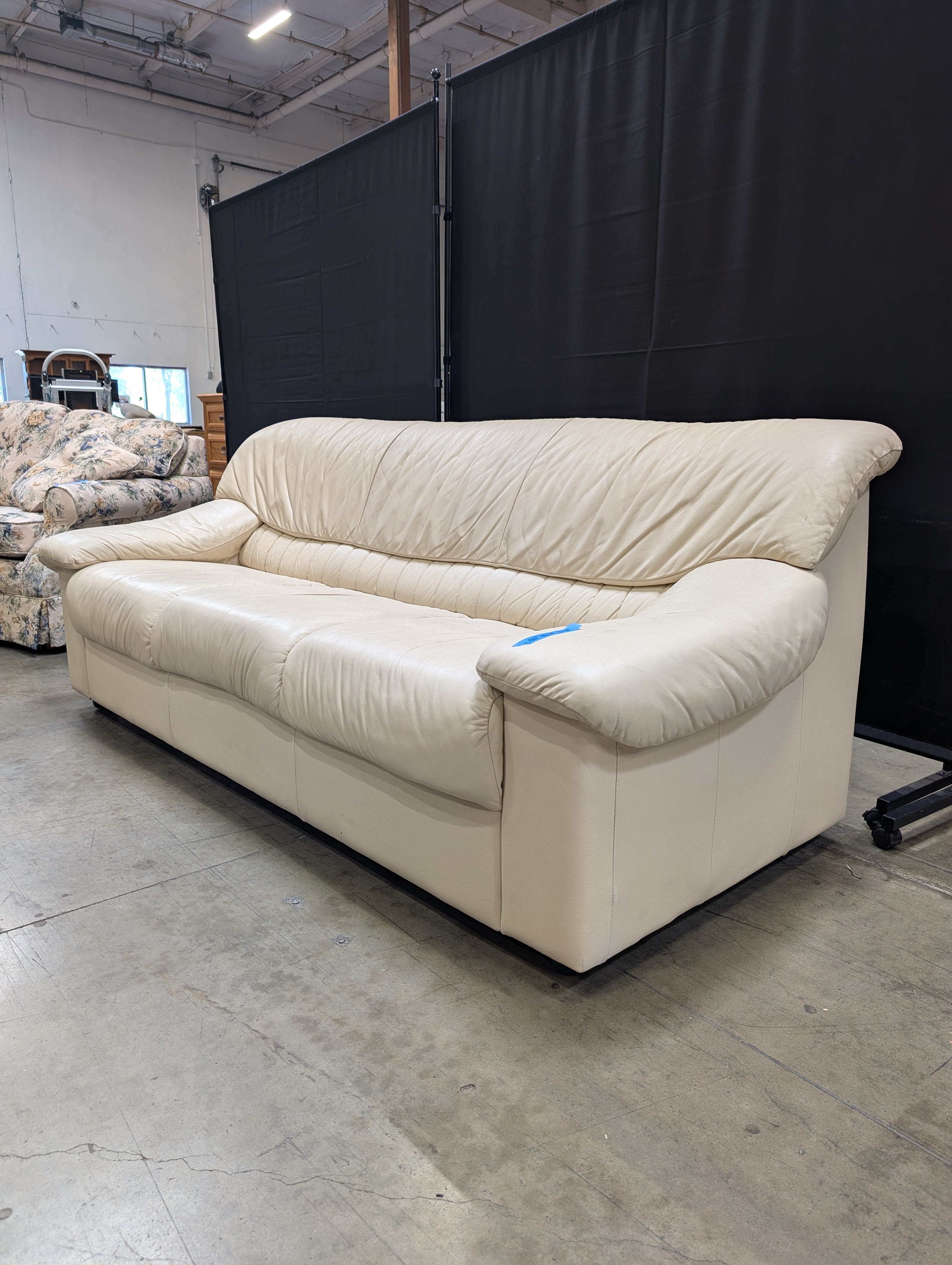 Cream Natuzzi Three-Seater Upholstered Sofa