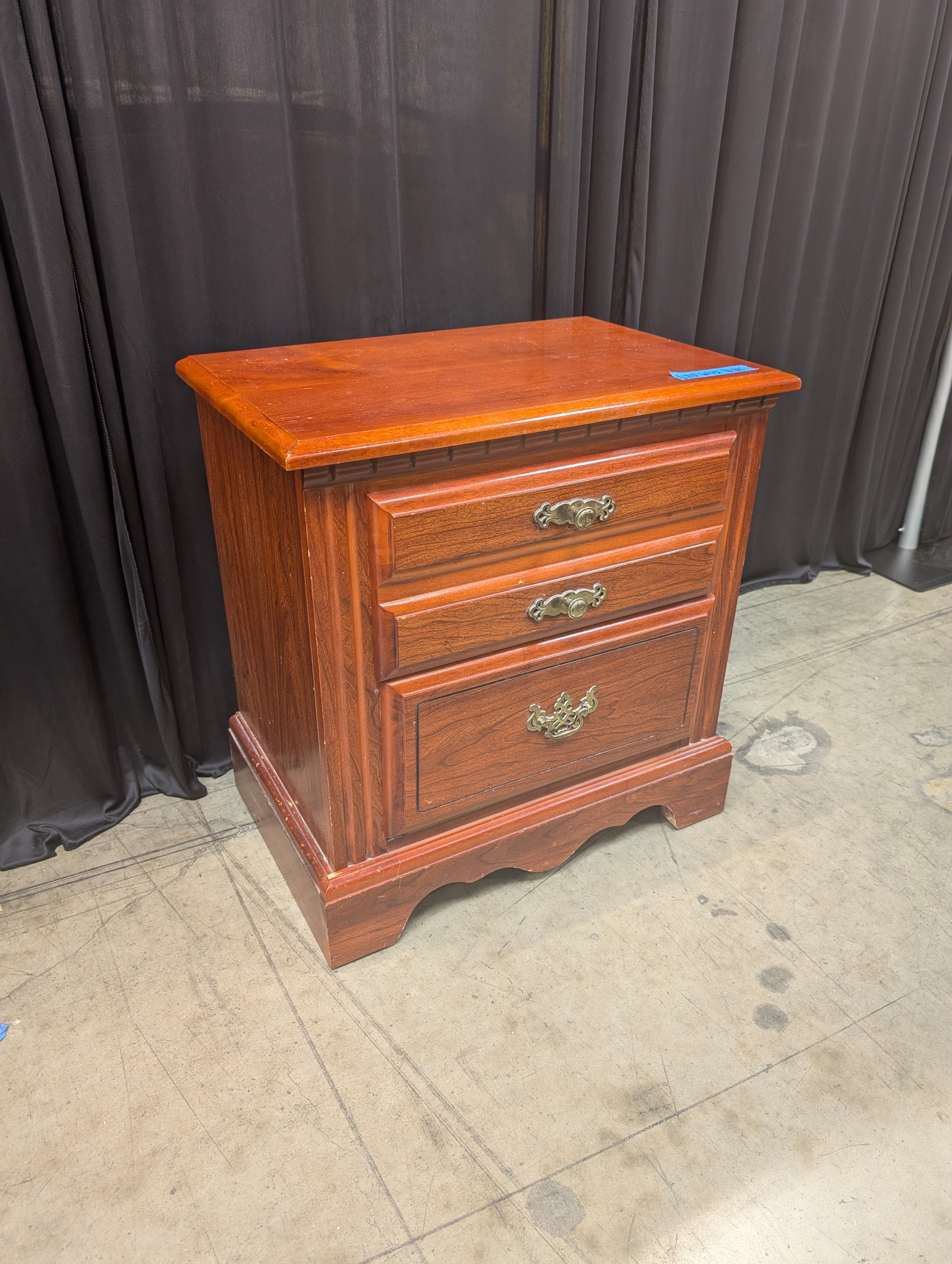 Traditional Three-Drawer Wood Nightstand with Brass Hardware