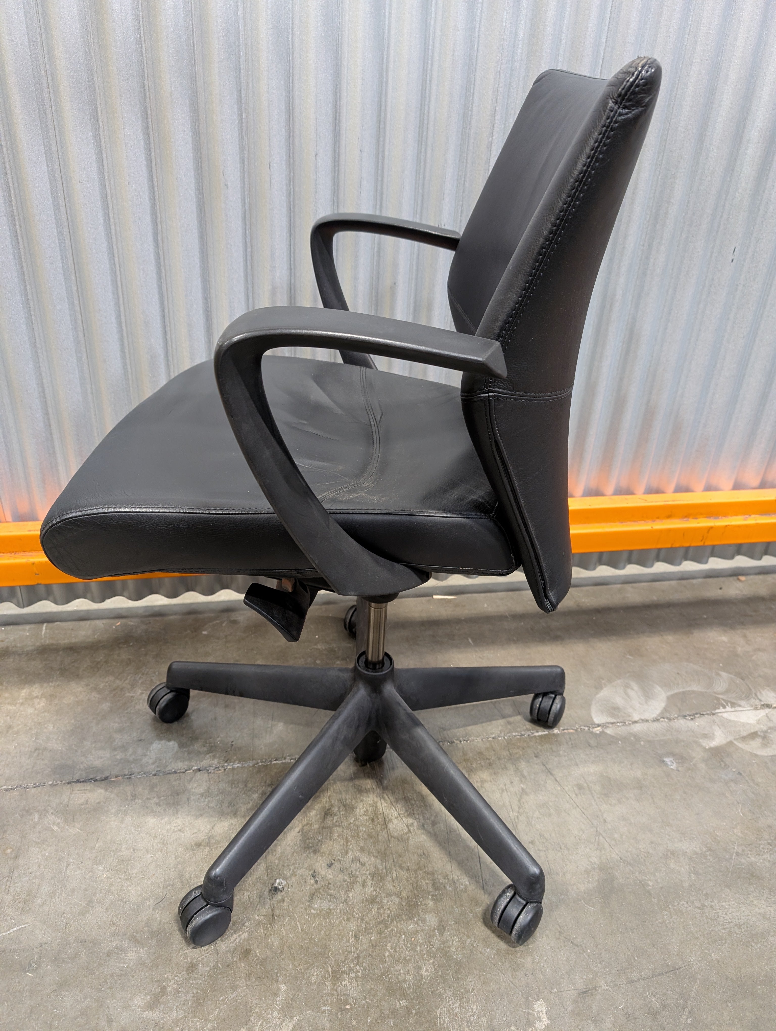 Sleek Black Leather Office Chair with Arms