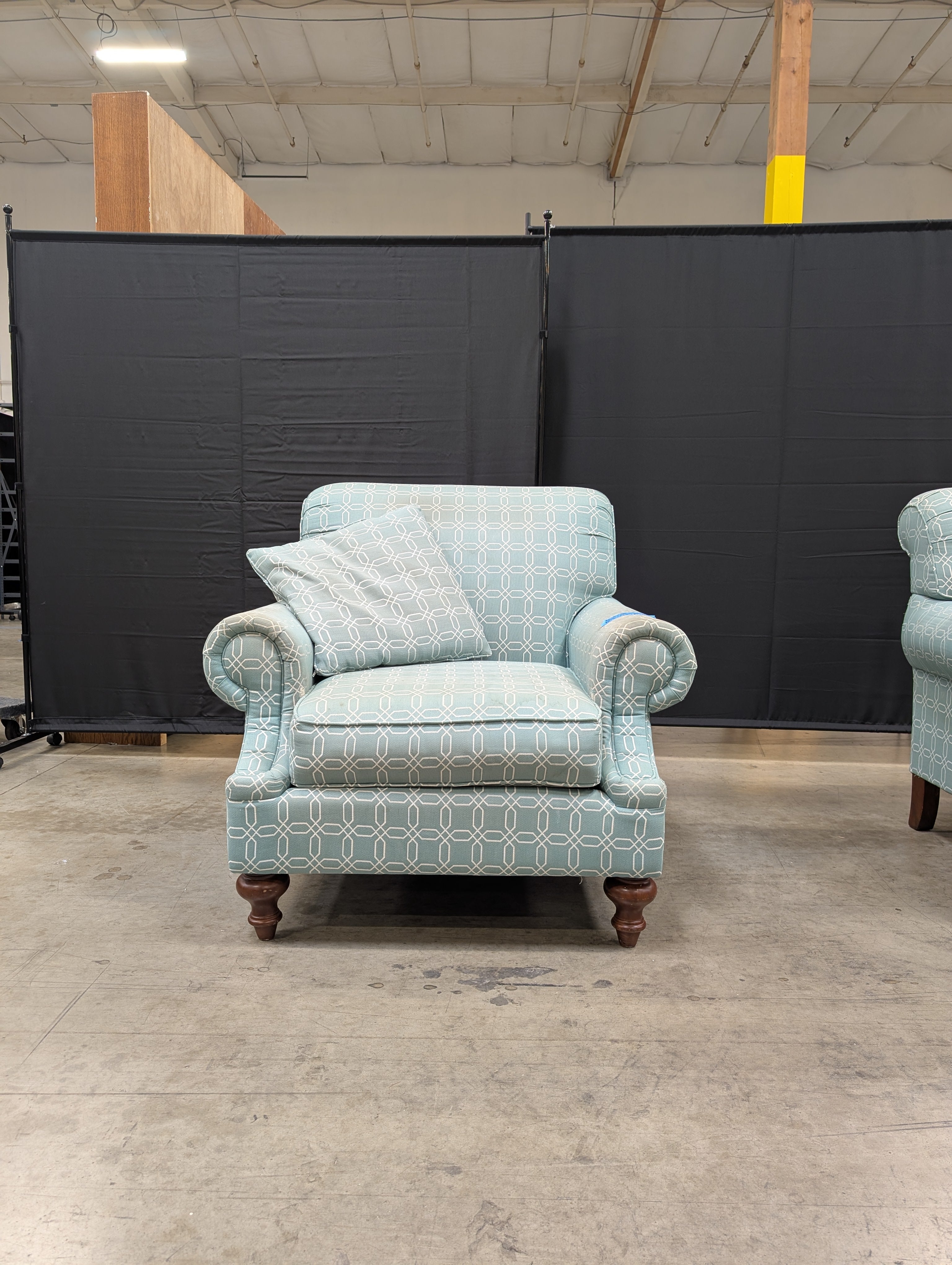 Comfortable Armchair with Green Wavy Pattern Slipcover