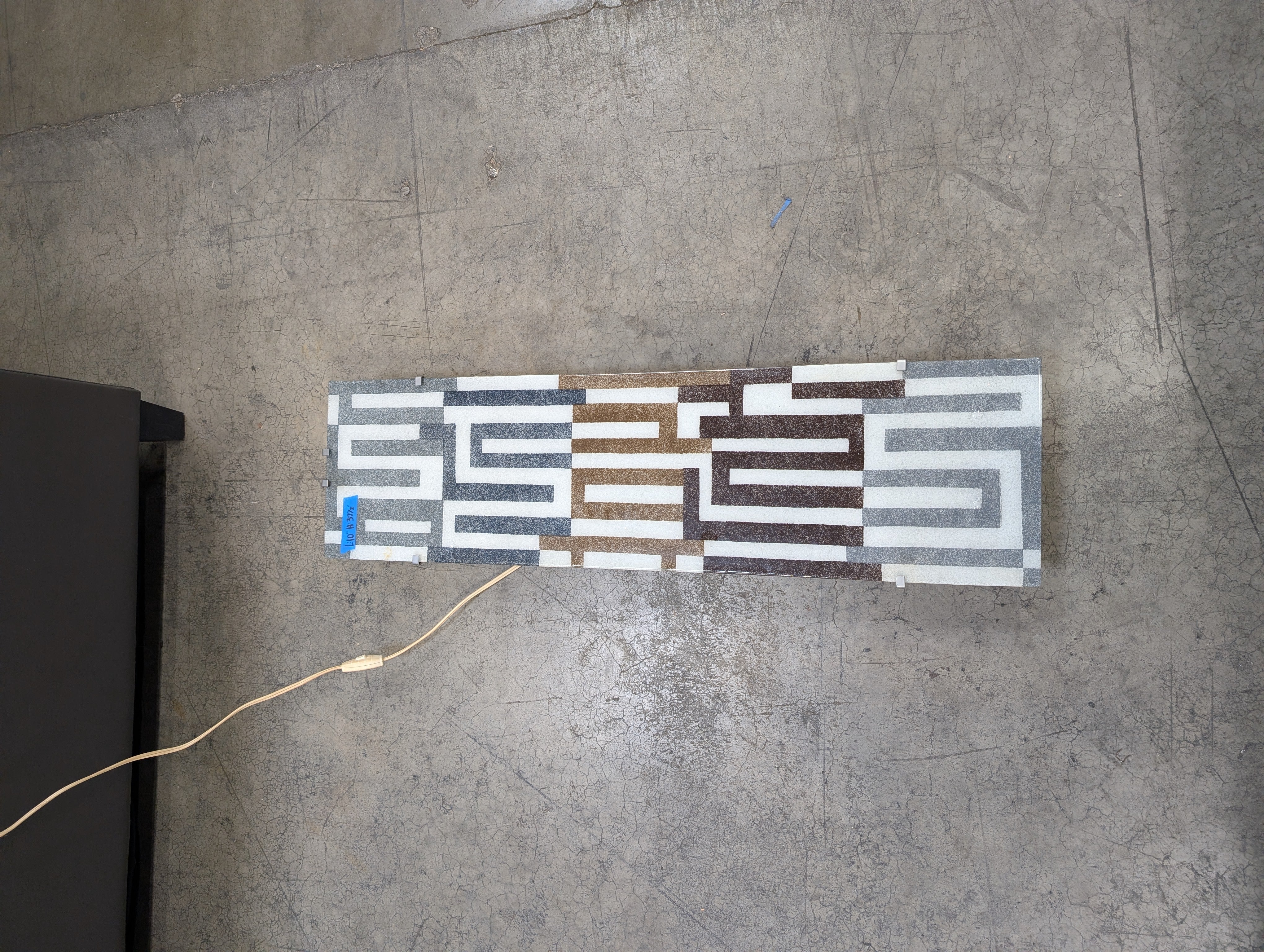 Silver and Brown Geometric Light