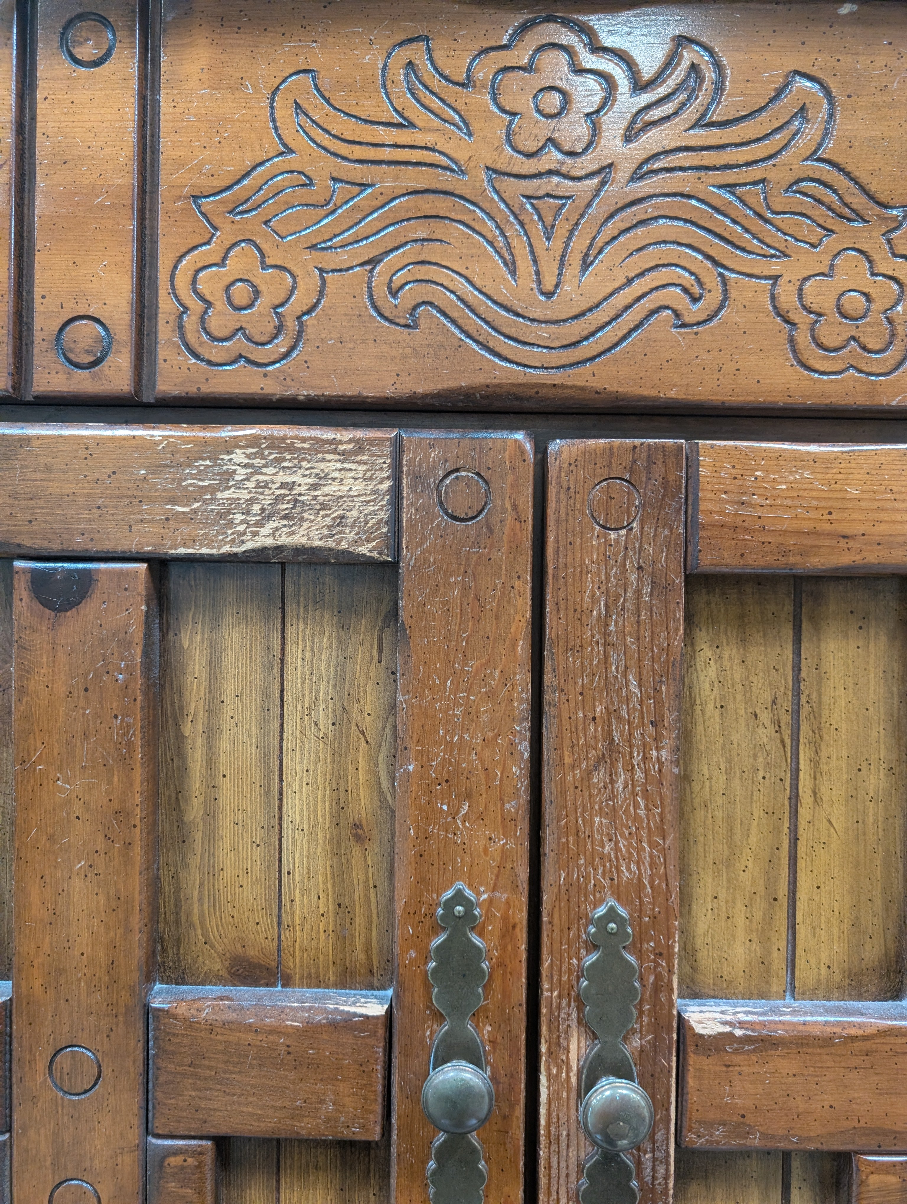 Rustic Brown Wood Armoire with Carved Details