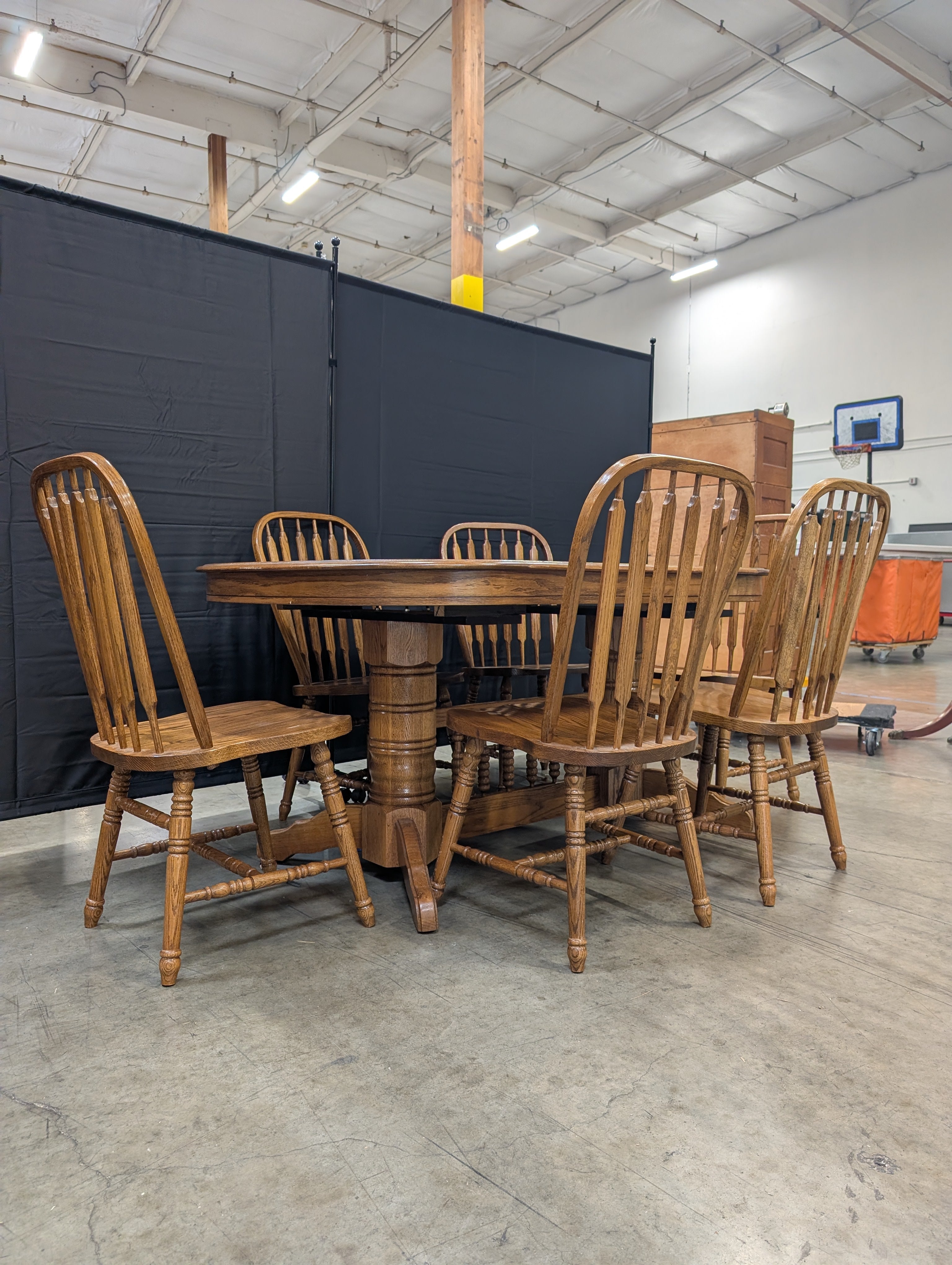 Oak Finish Dining Table with Six Spindle Back Chairs