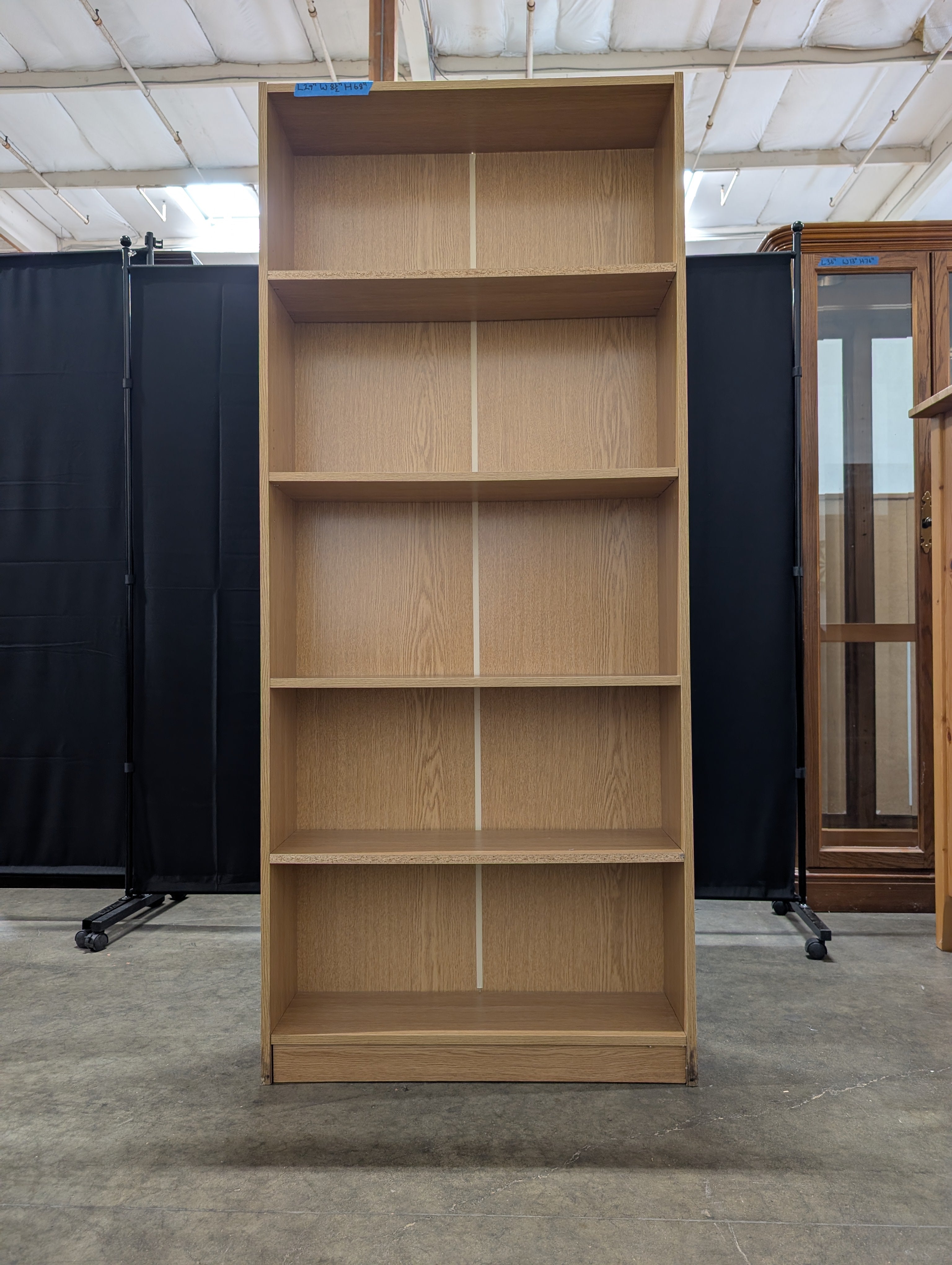 Versatile Light Wood Tone Bookcase with Adjustable Shelves