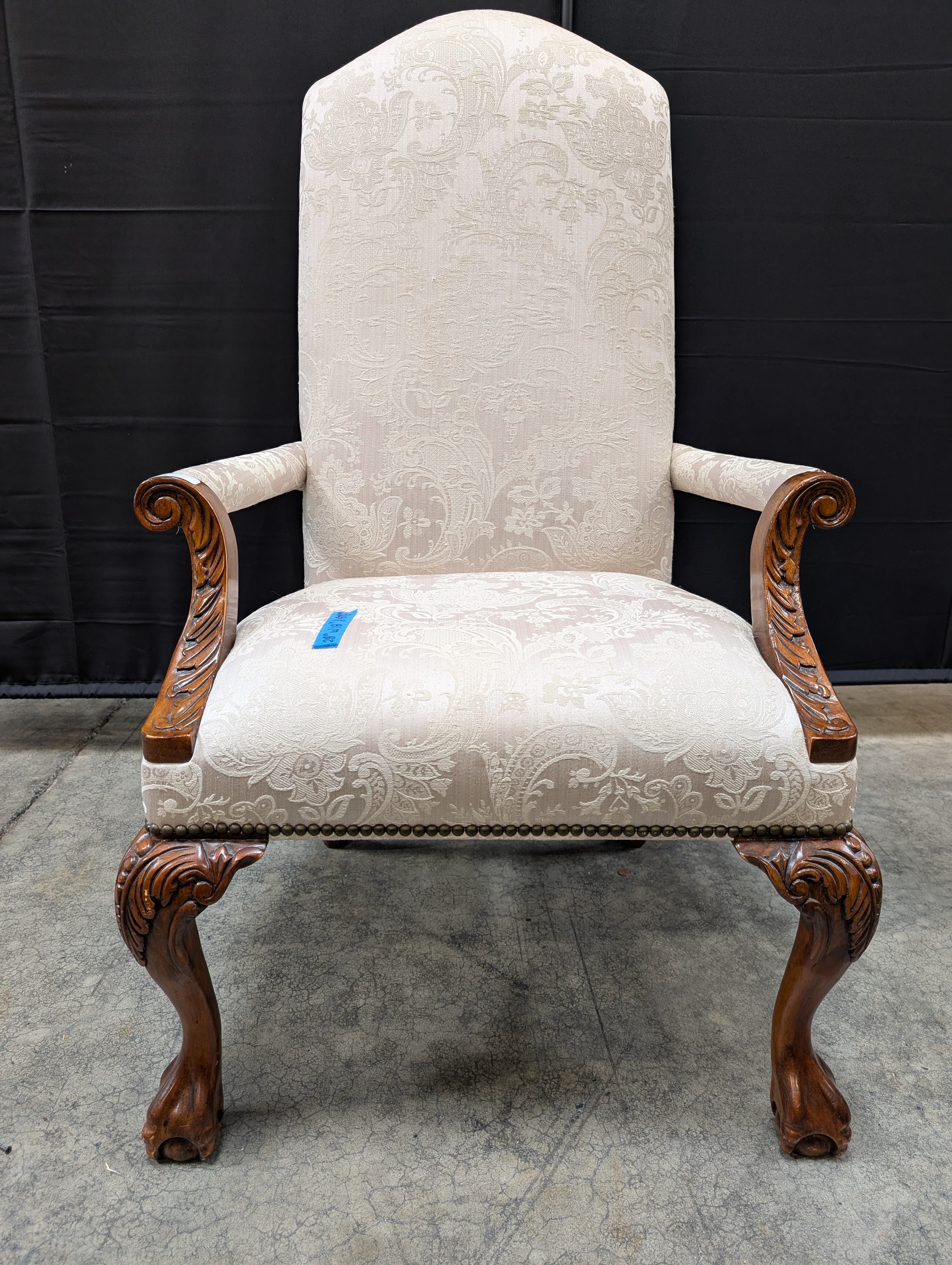 Ornate Carved Wood High-Back Armchair with Damask Upholstery