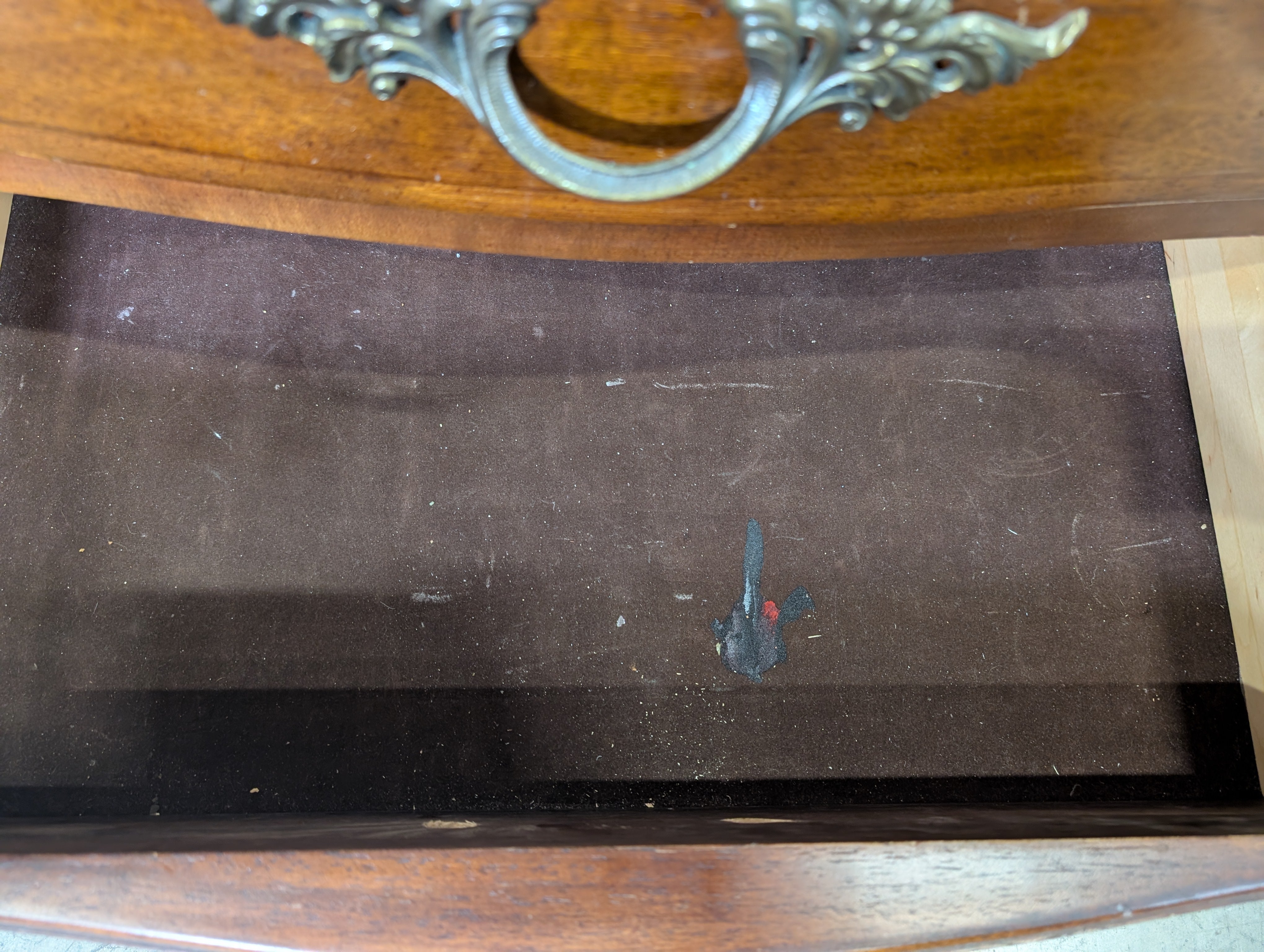 Traditional Cherry Stained Wood Dresser with Ornate Hardware