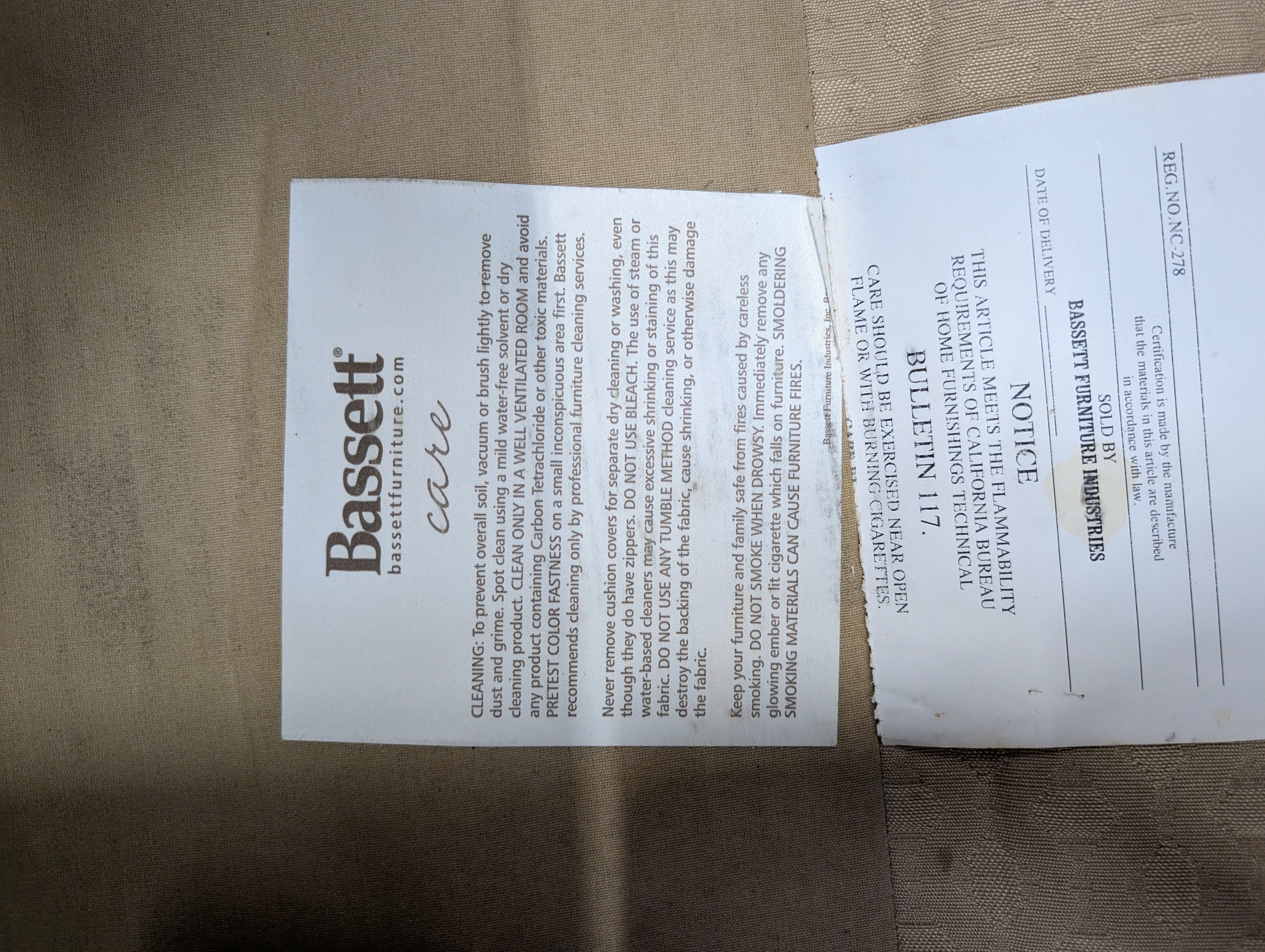 Classic Tan Two-Seater Sofa with Rolled Arms