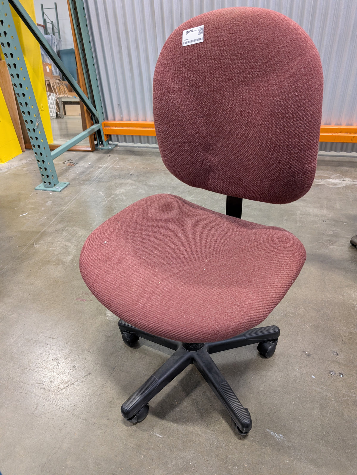 Red armless office chair