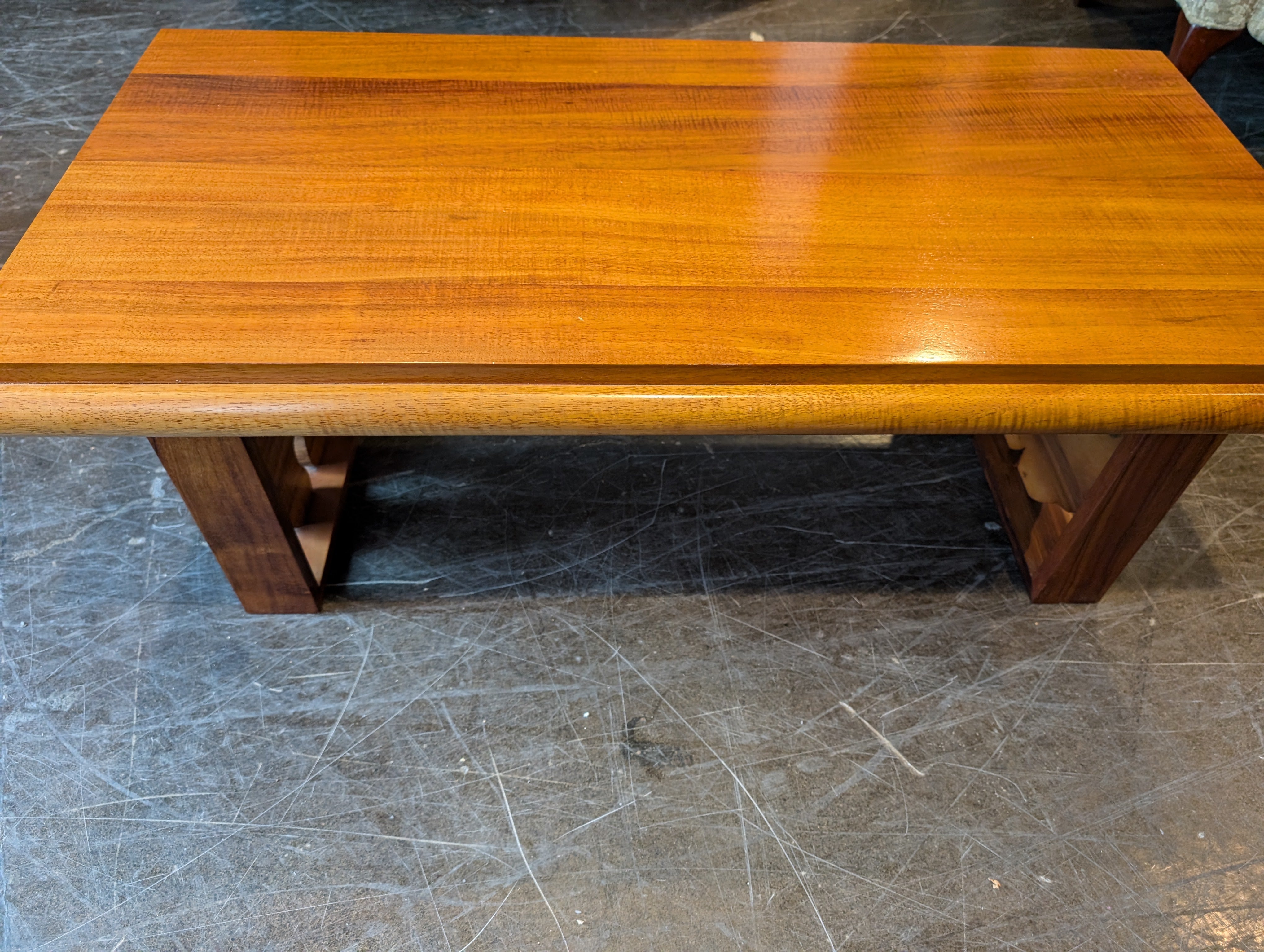 Rich Brown Hardwood Coffee Table with Carved Detail