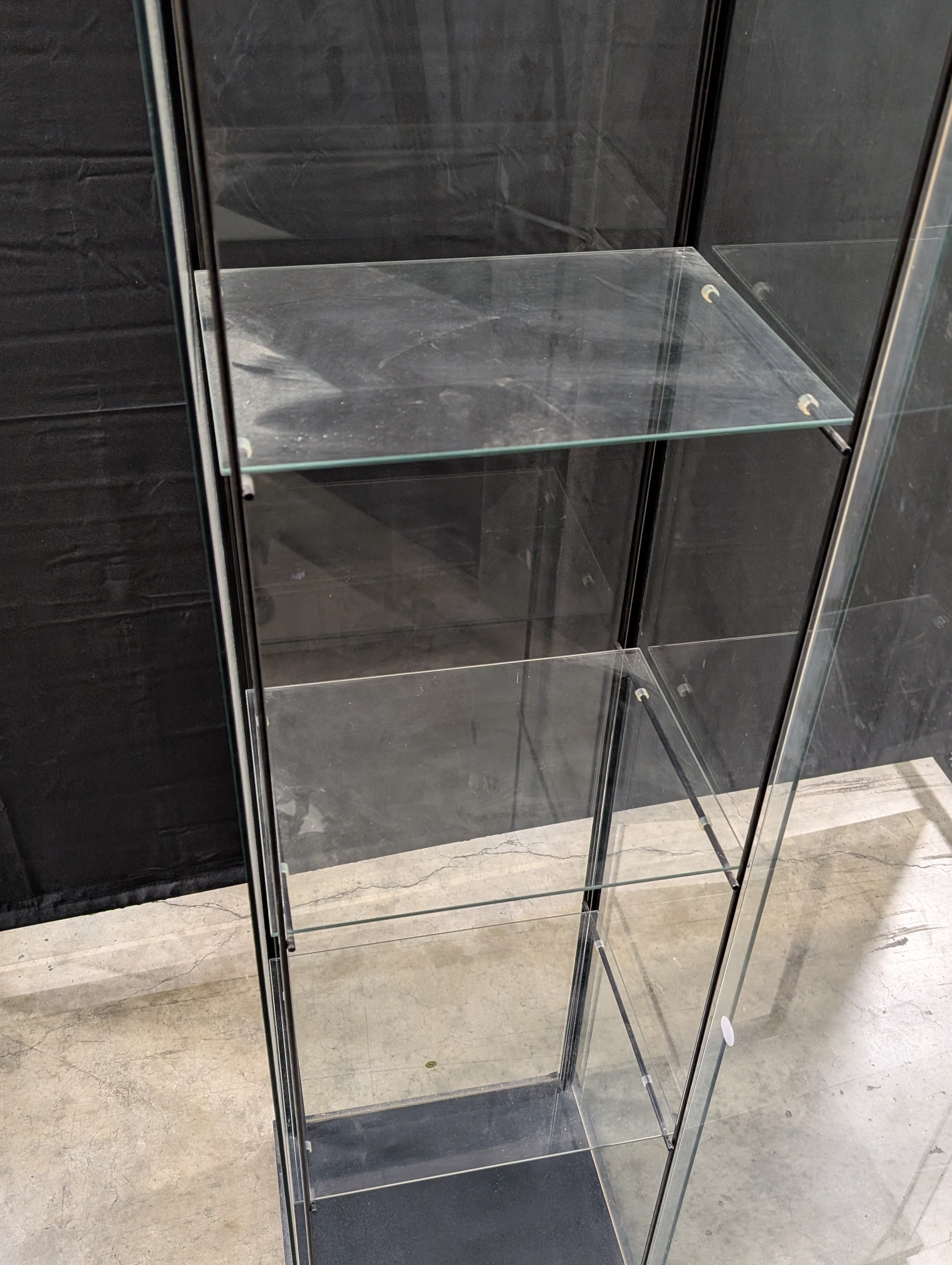 Sleek Glass Display Cabinet with Black Frame