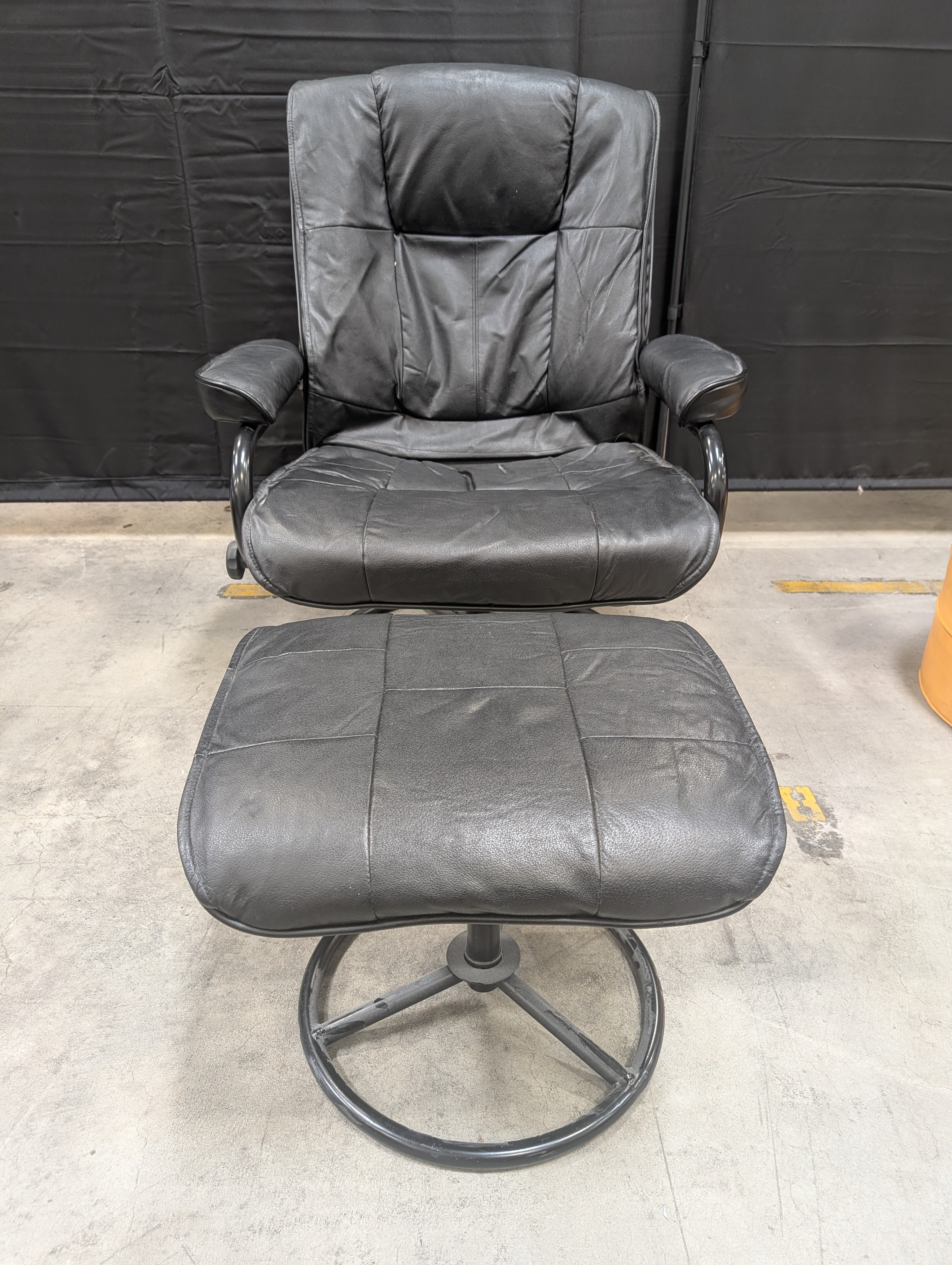 Padded Black Recliner with Ottoman