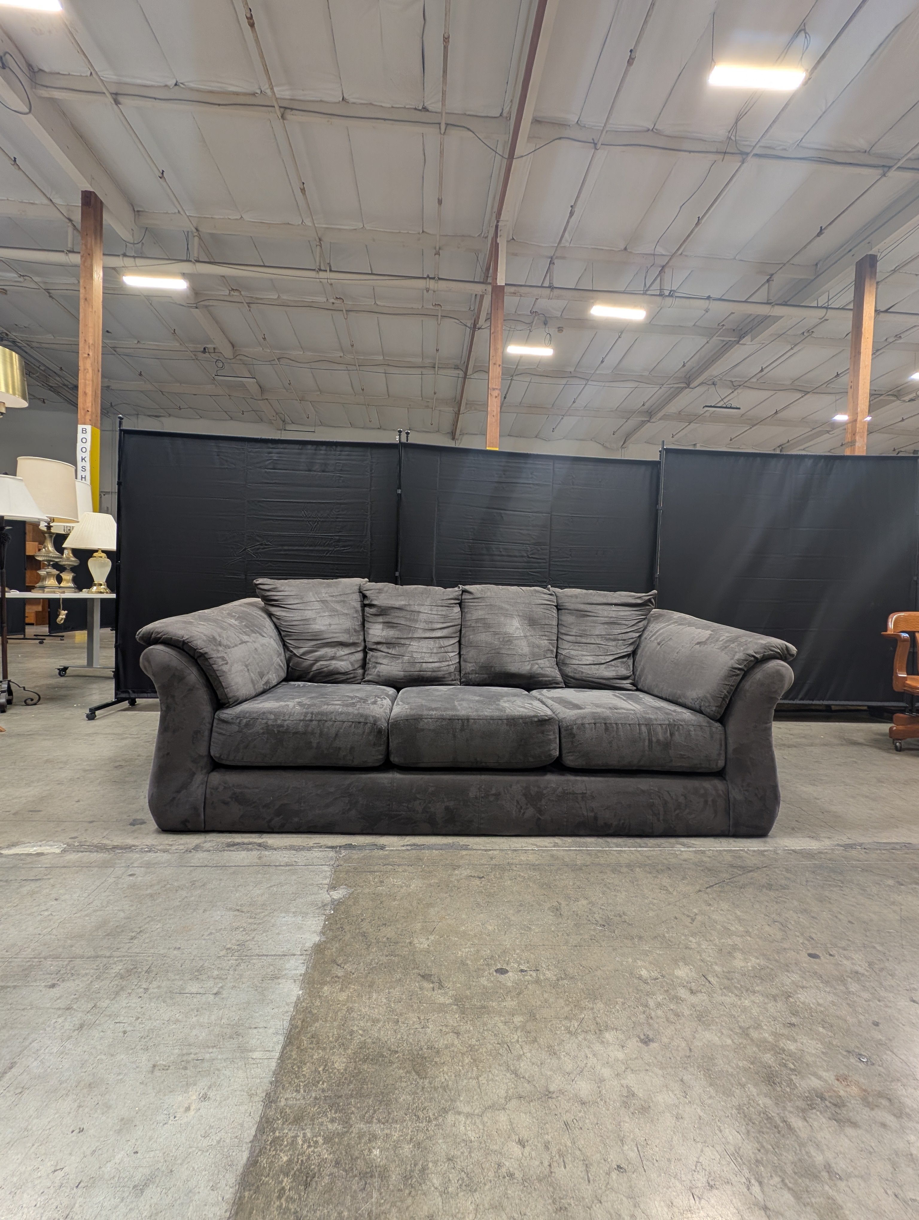 Spacious Three-Seater Grey Upholstered Sofa