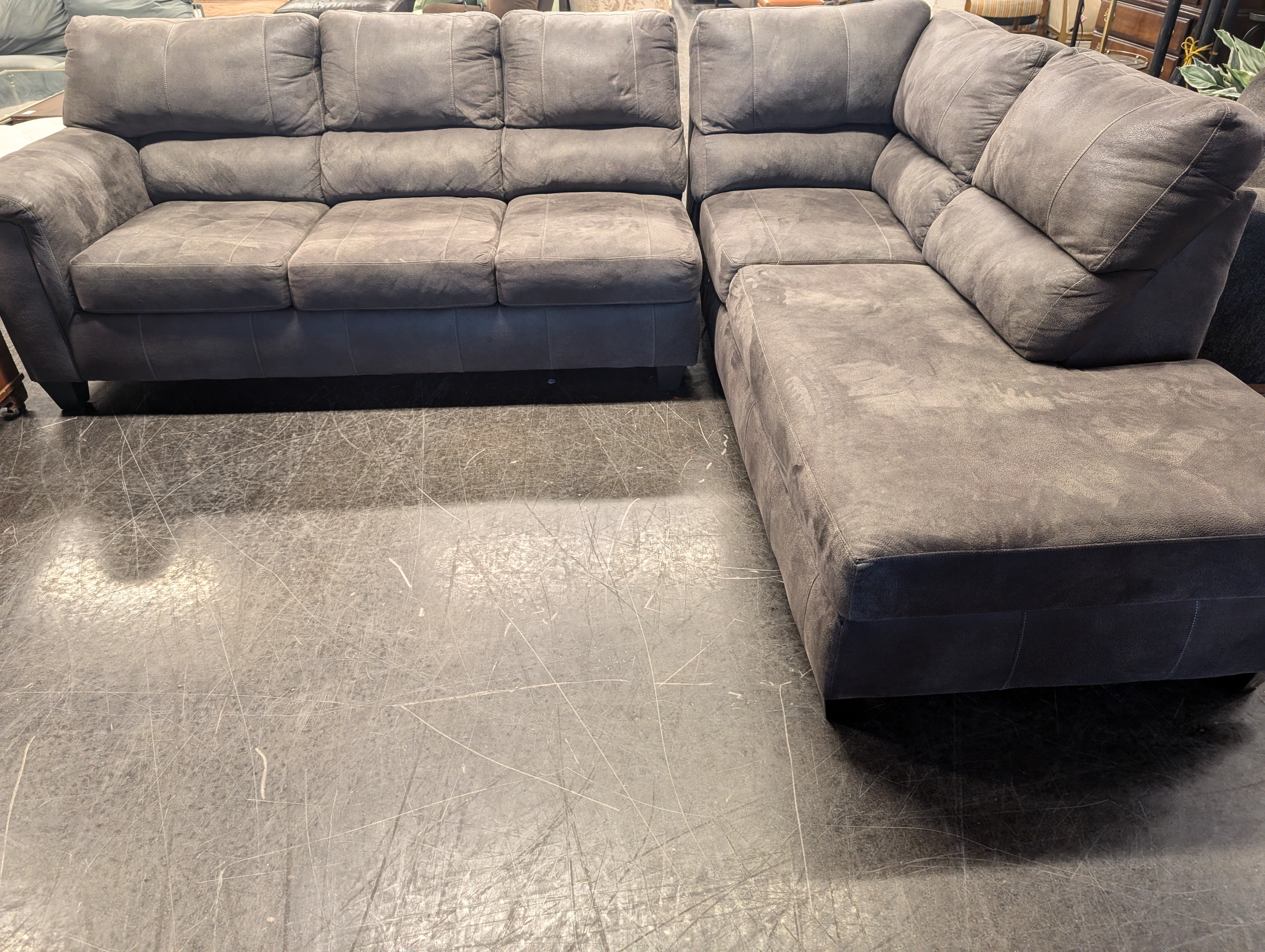 Spacious Taupe Sectional Sofa with Integrated Chaise