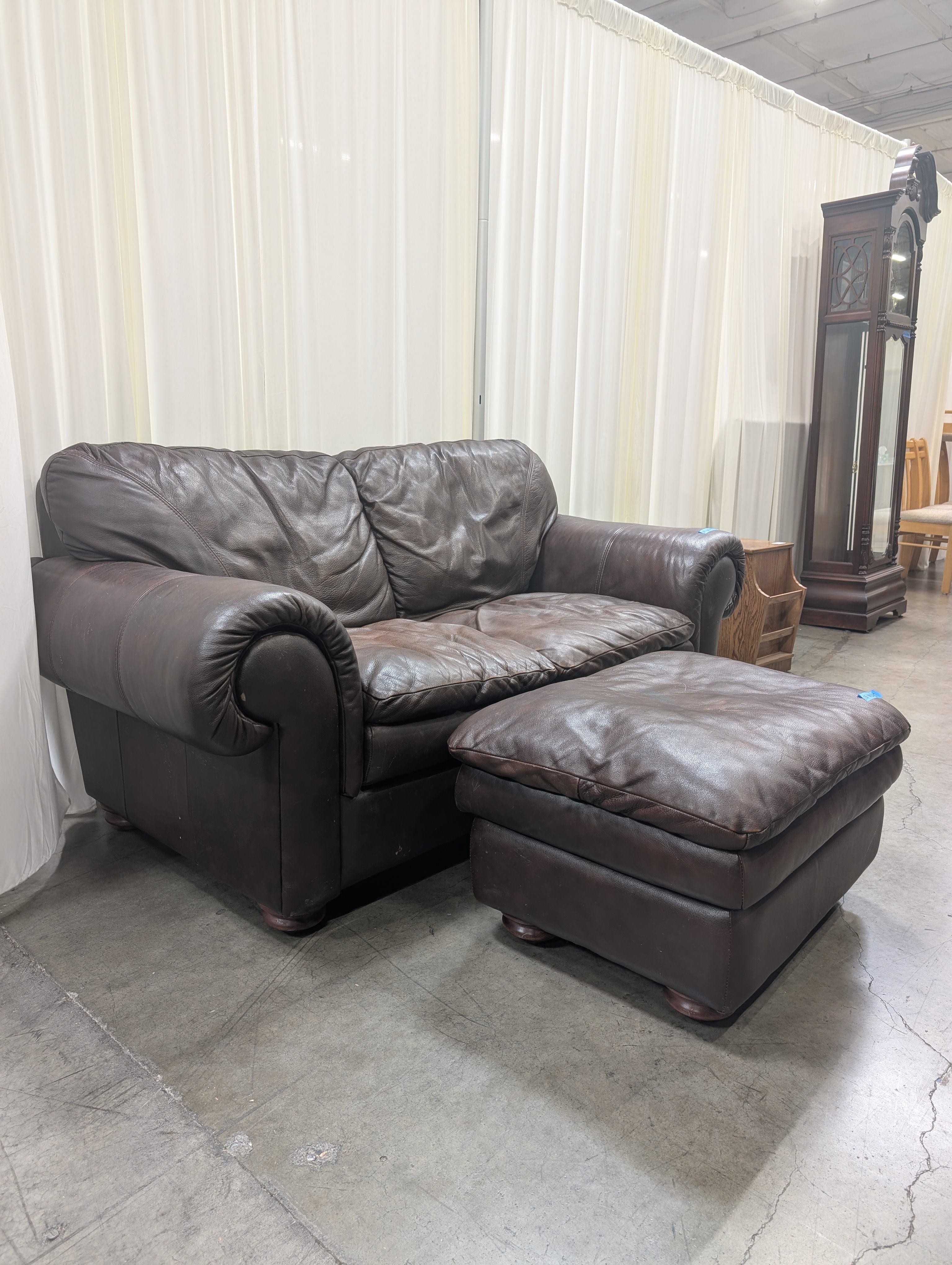 Dark Brown Leather Rolled Arm Couch with matching Ottoman