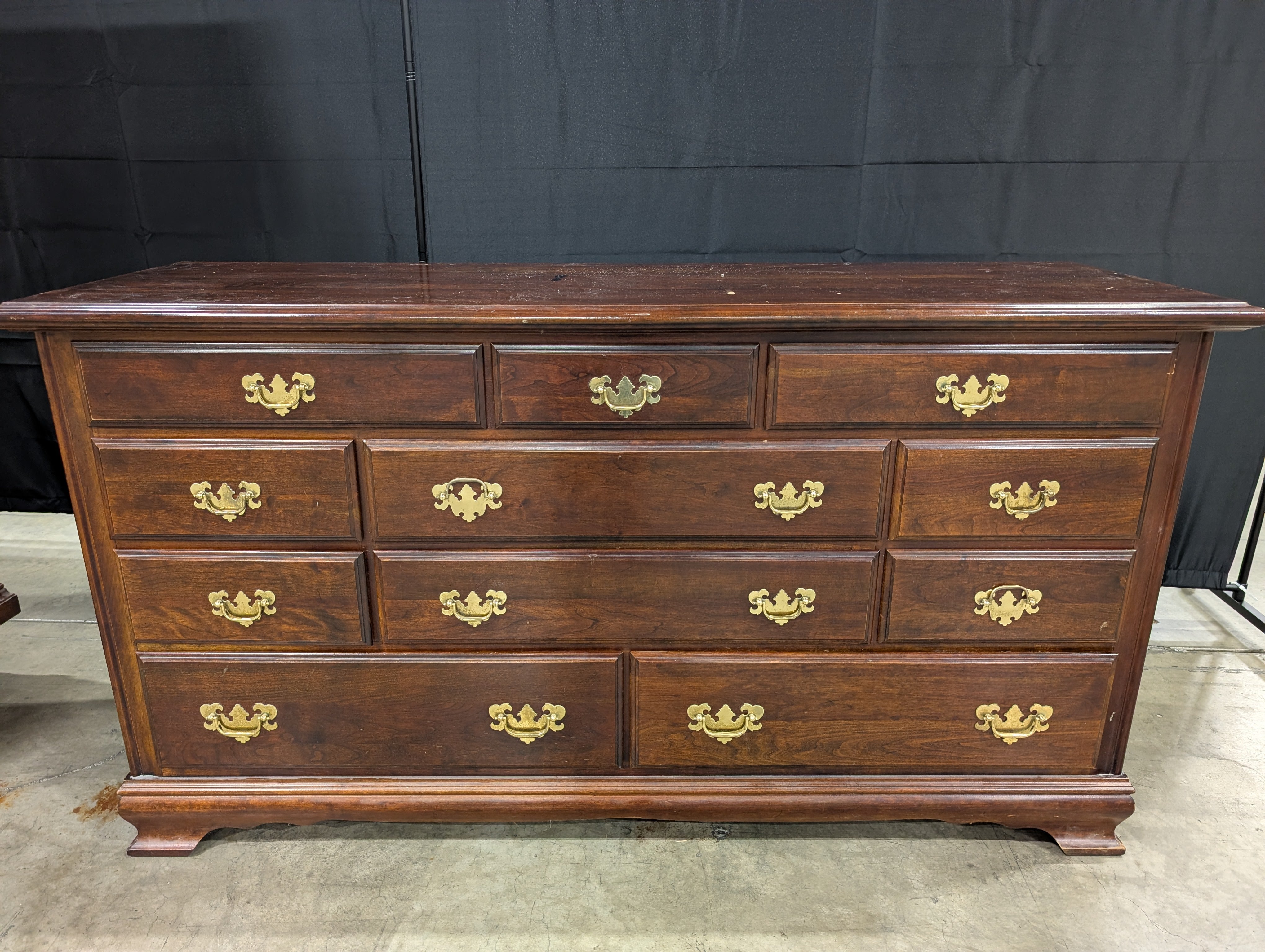 Traditional Dark Wood Dresser with Brass Bail Pulls