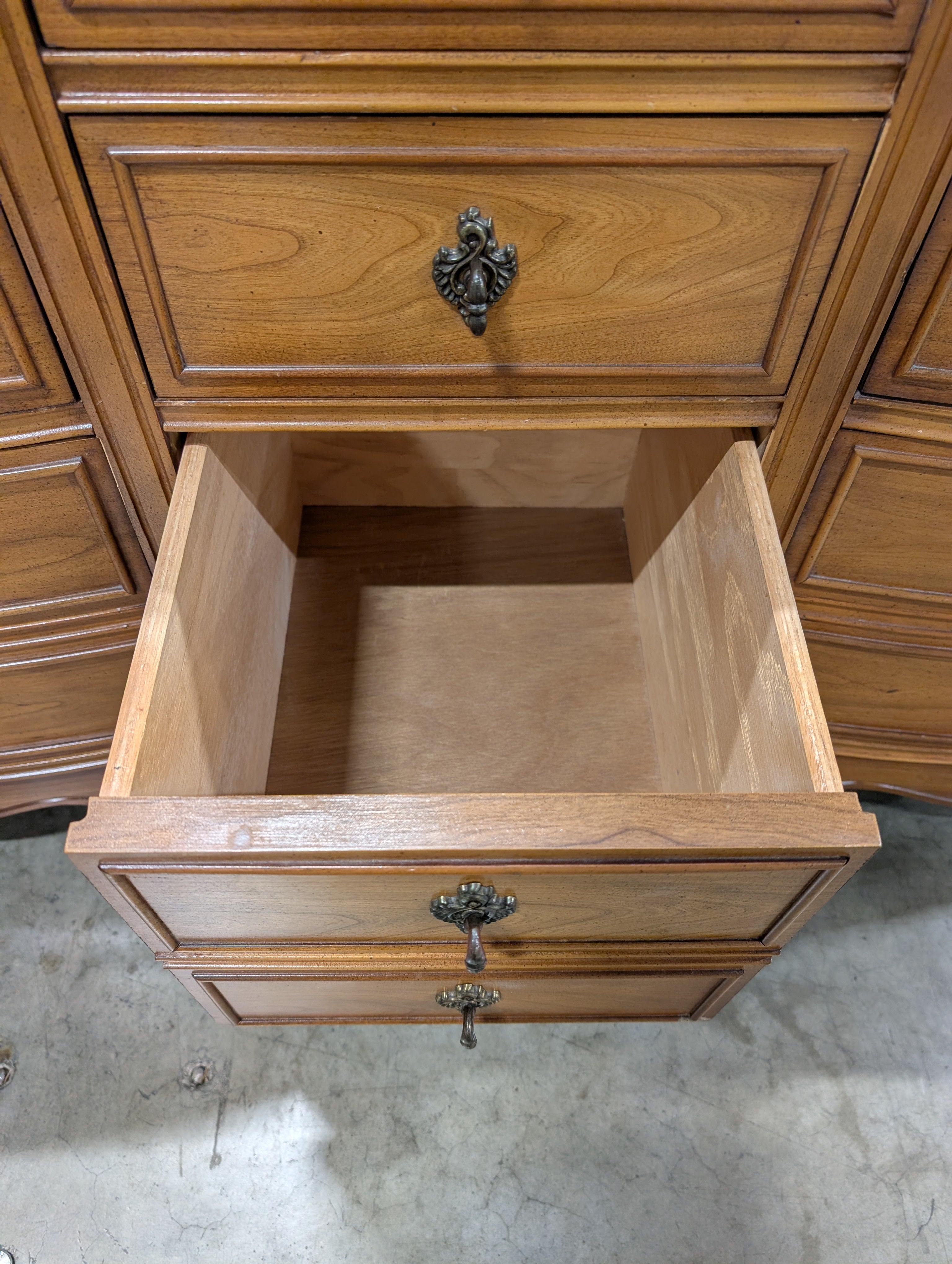 Vintage French Provincial Nine-Drawer Wood Dresser